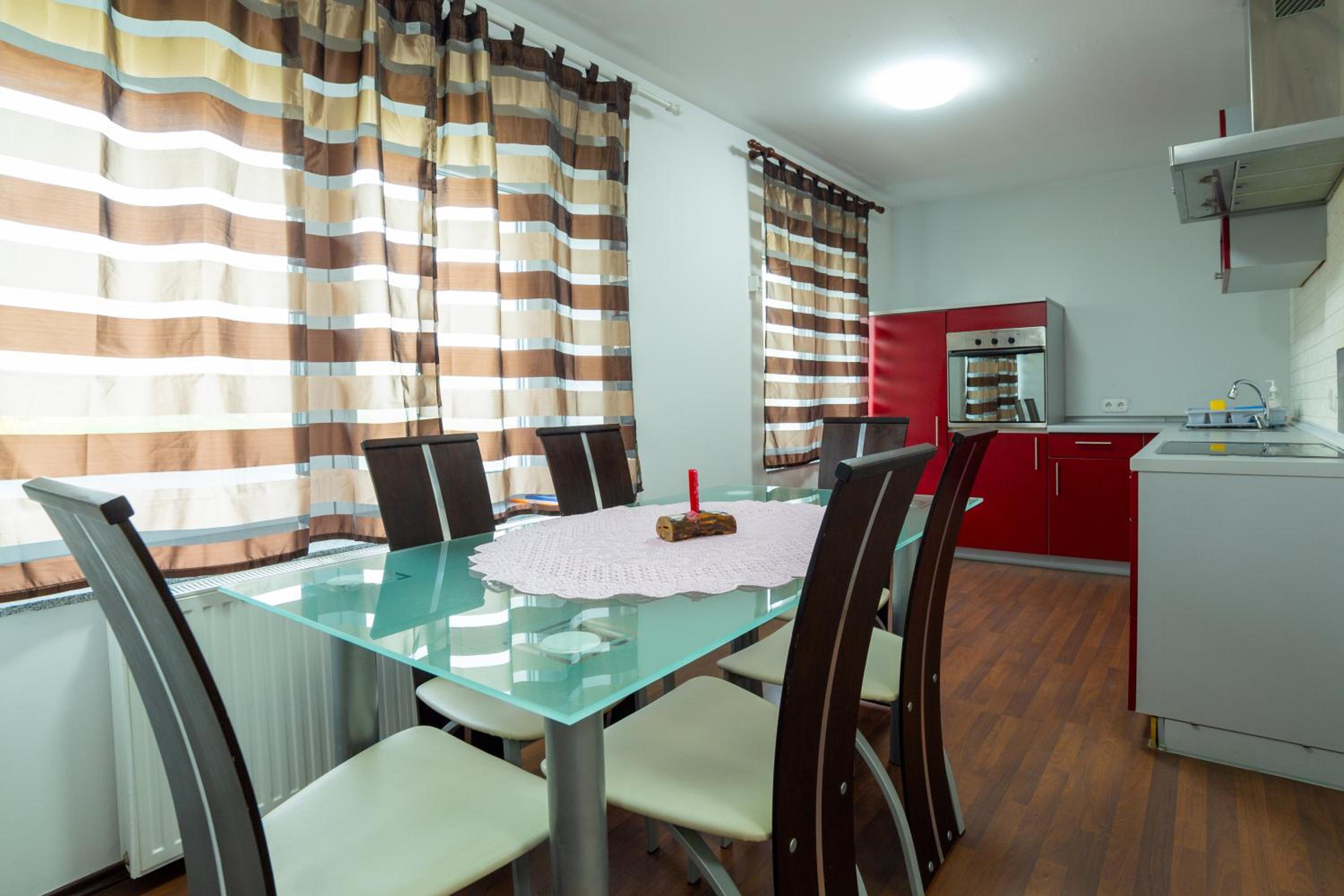 Three-Bedroom Apartment - Photo 2