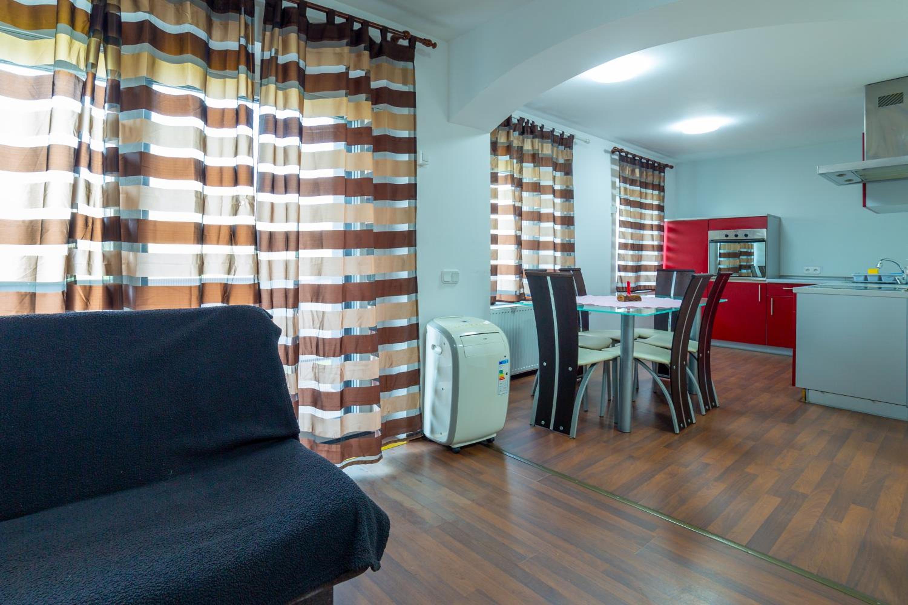 Three-Bedroom Apartment - Photo 1