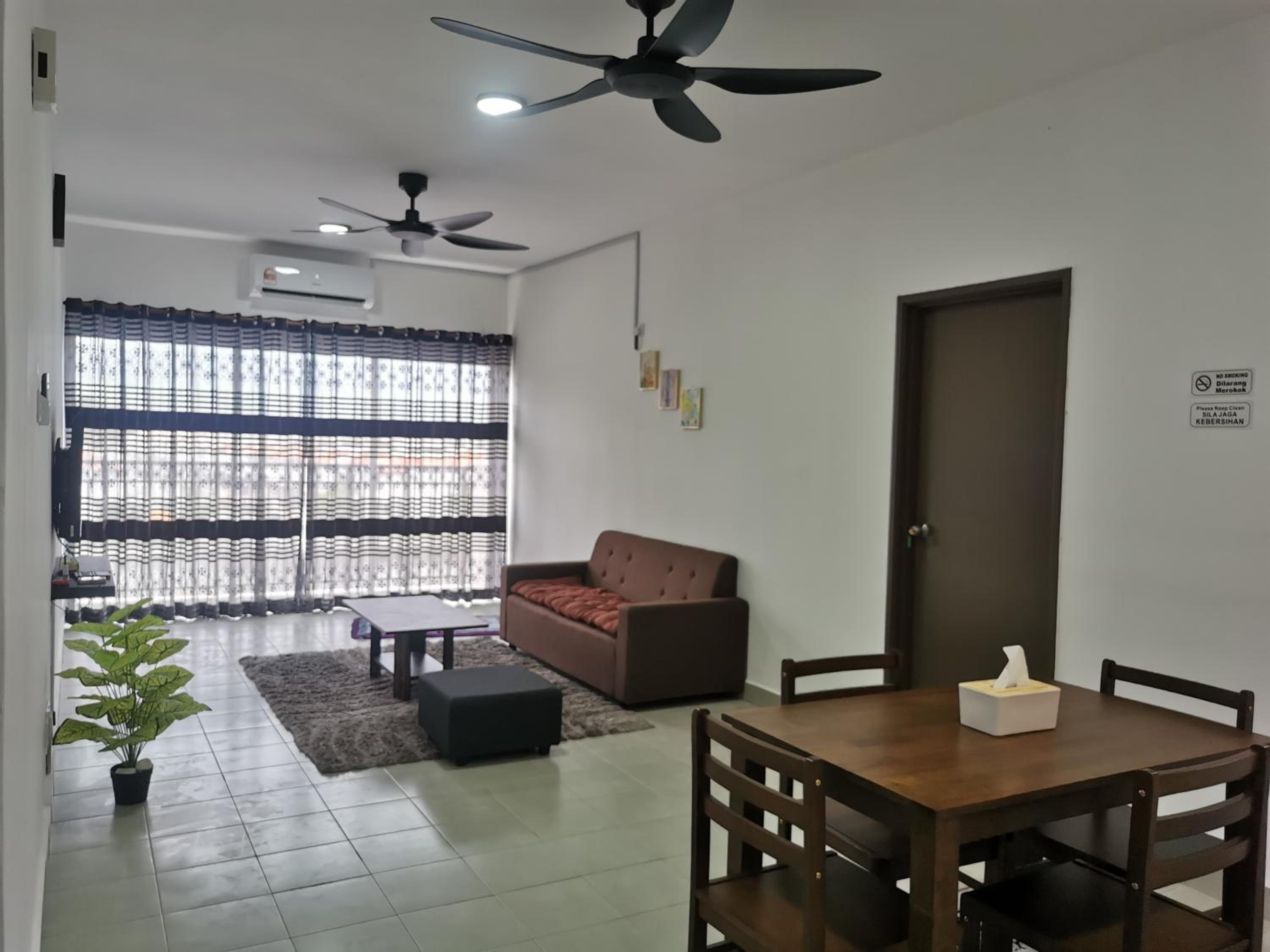 Three-Bedroom Apartment photo 1