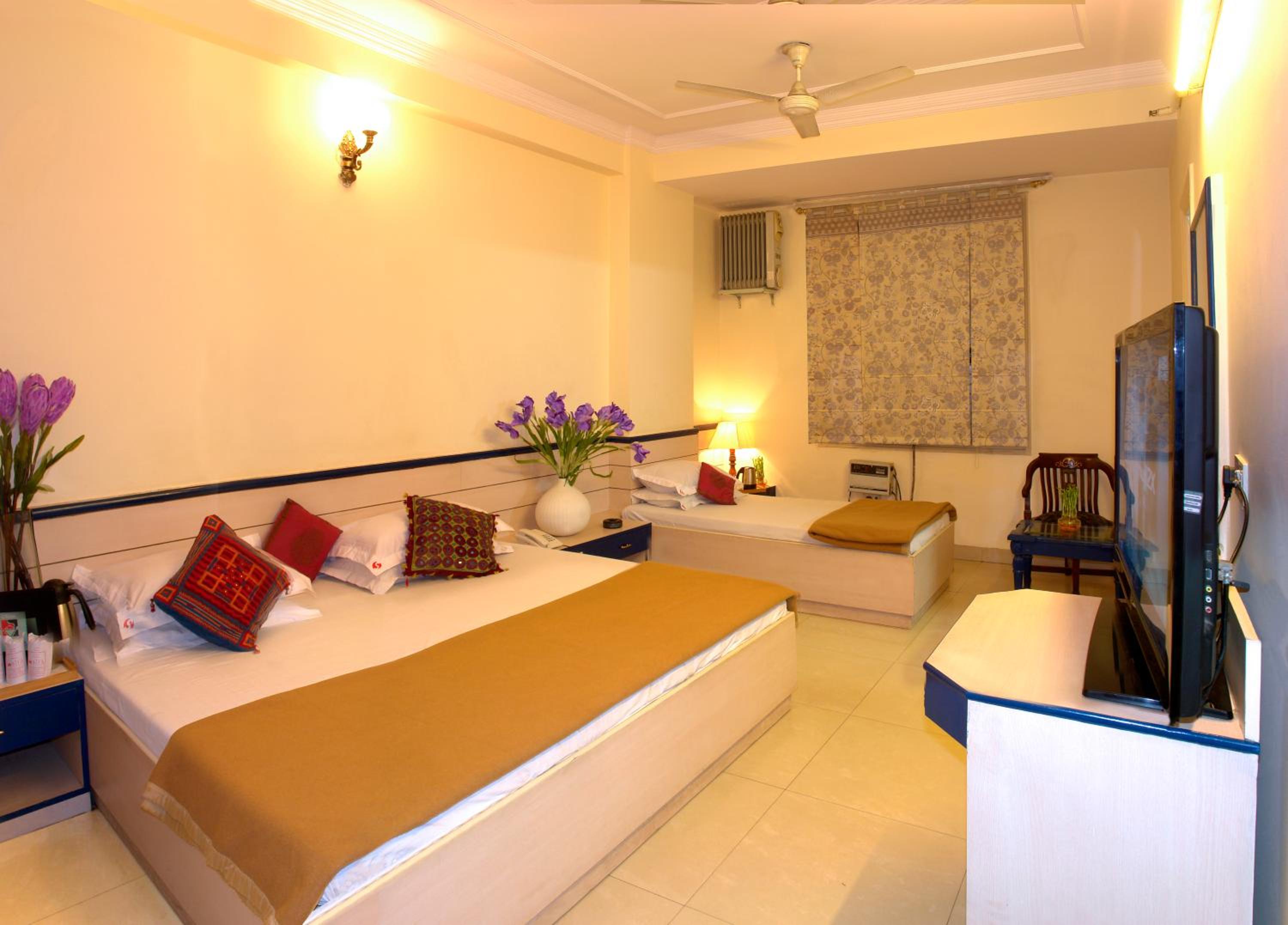 Deluxe Triple Room - Photo 9