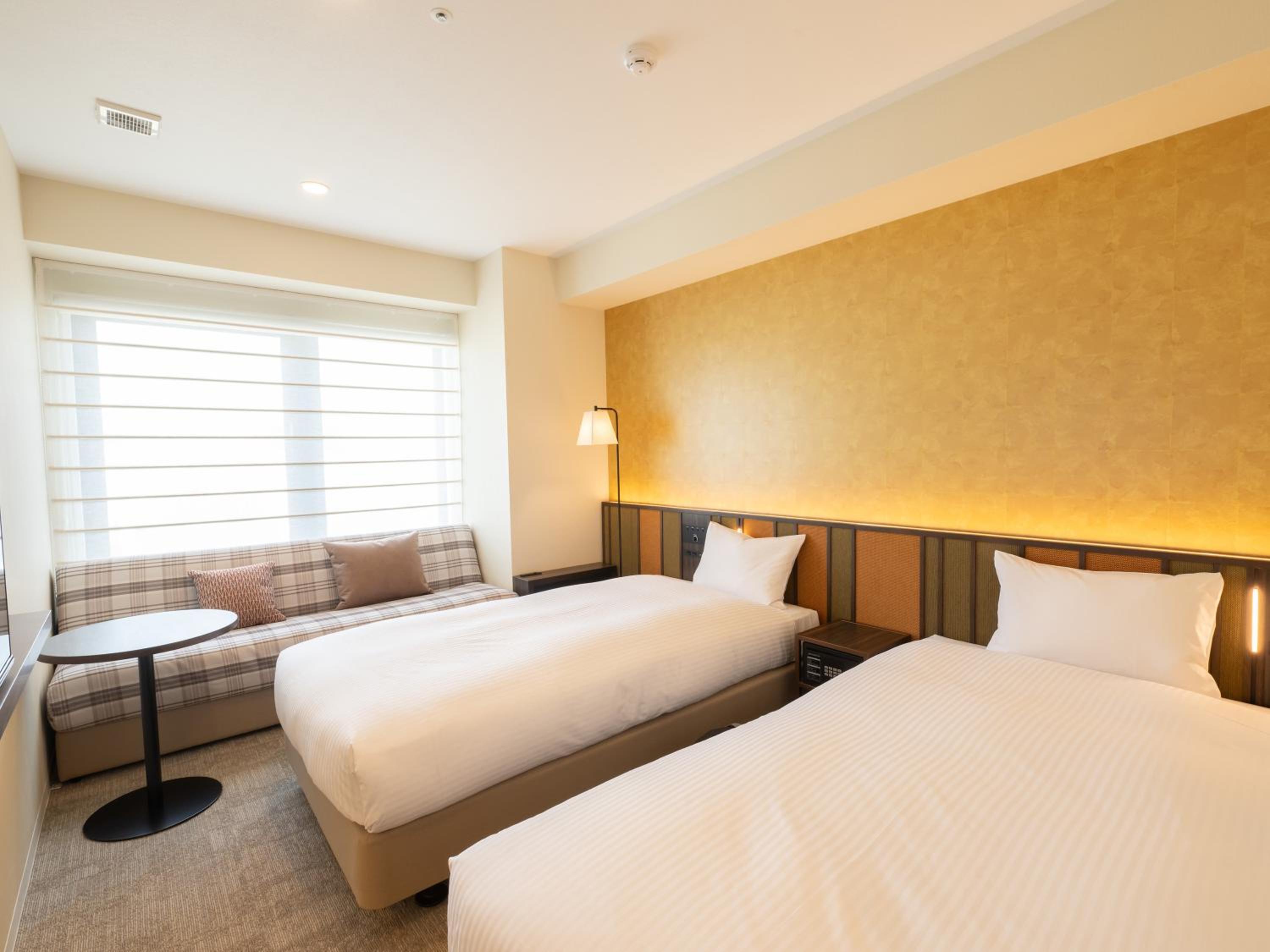Moderate Twin Room with Sofa Bed - Photo 1
