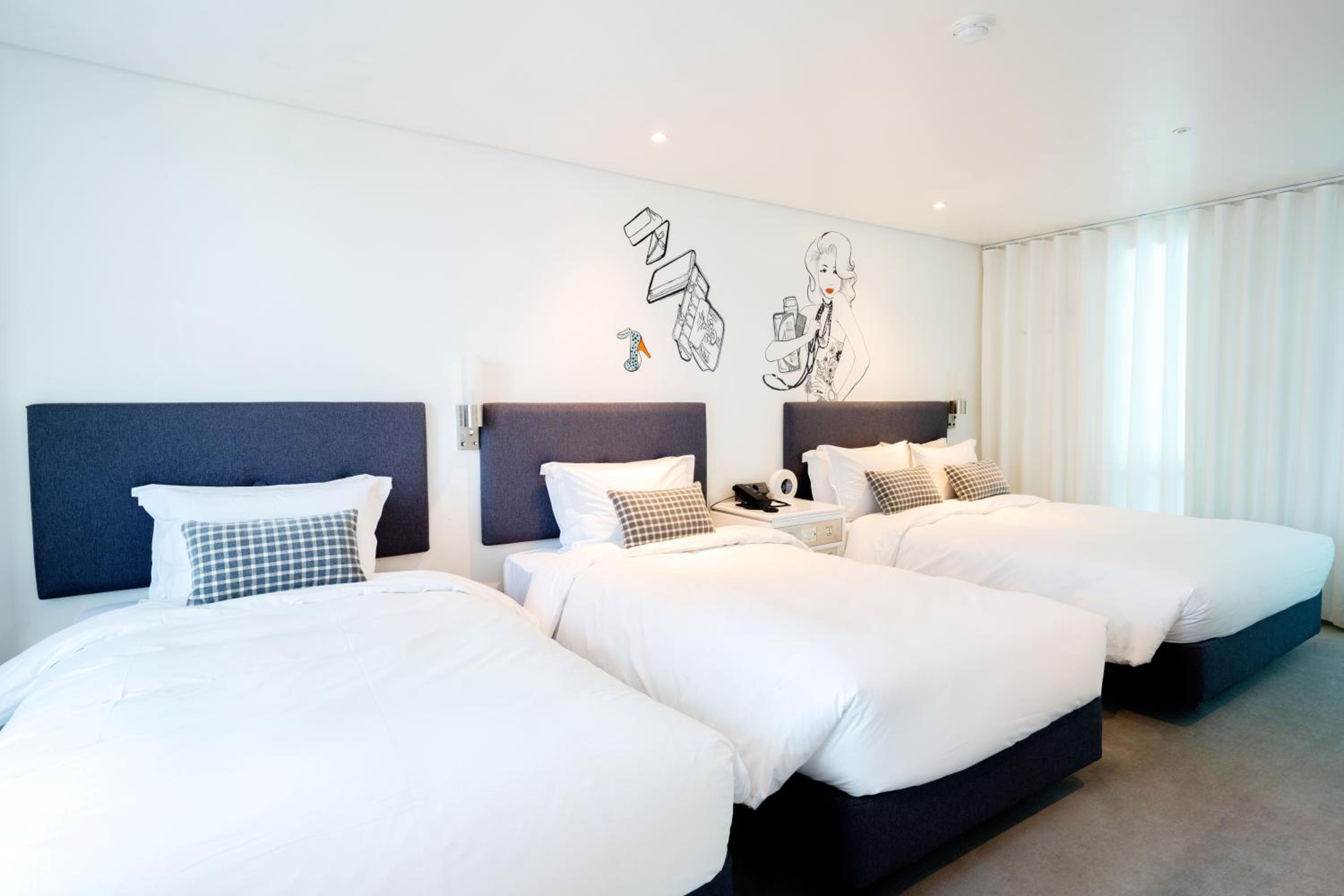 Deluxe Quadruple Room - Photo 12
