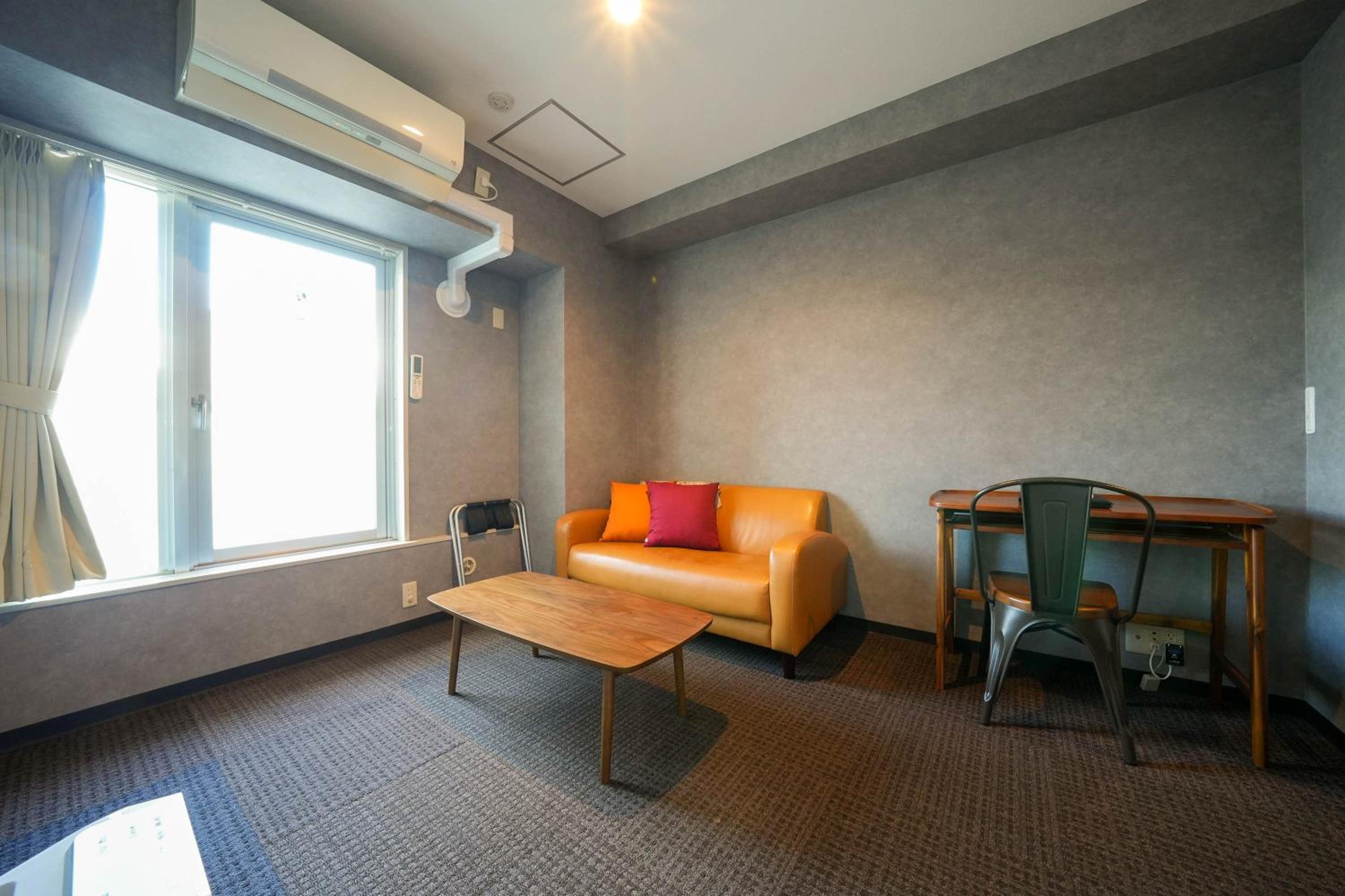 Deluxe Family Suite - Photo 17