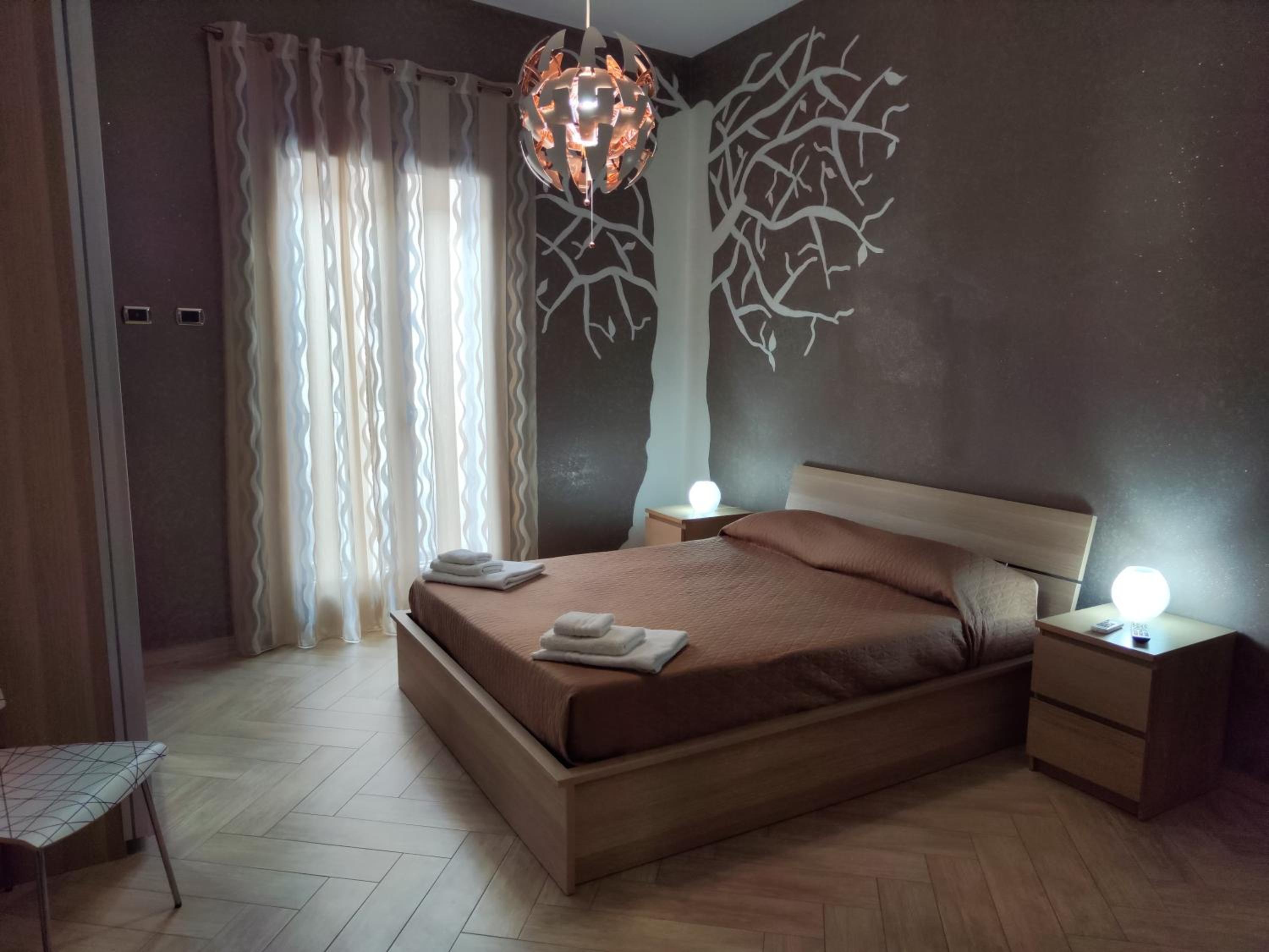 Deluxe Room - Photo 1