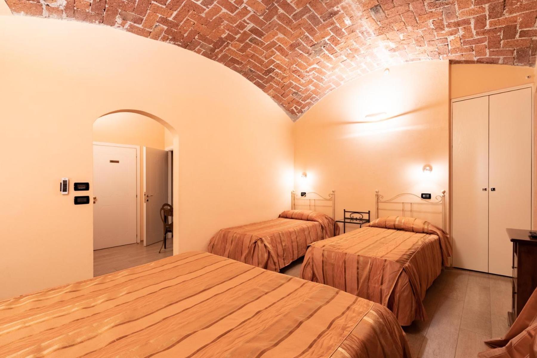 Deluxe Quadruple Room - Photo 5