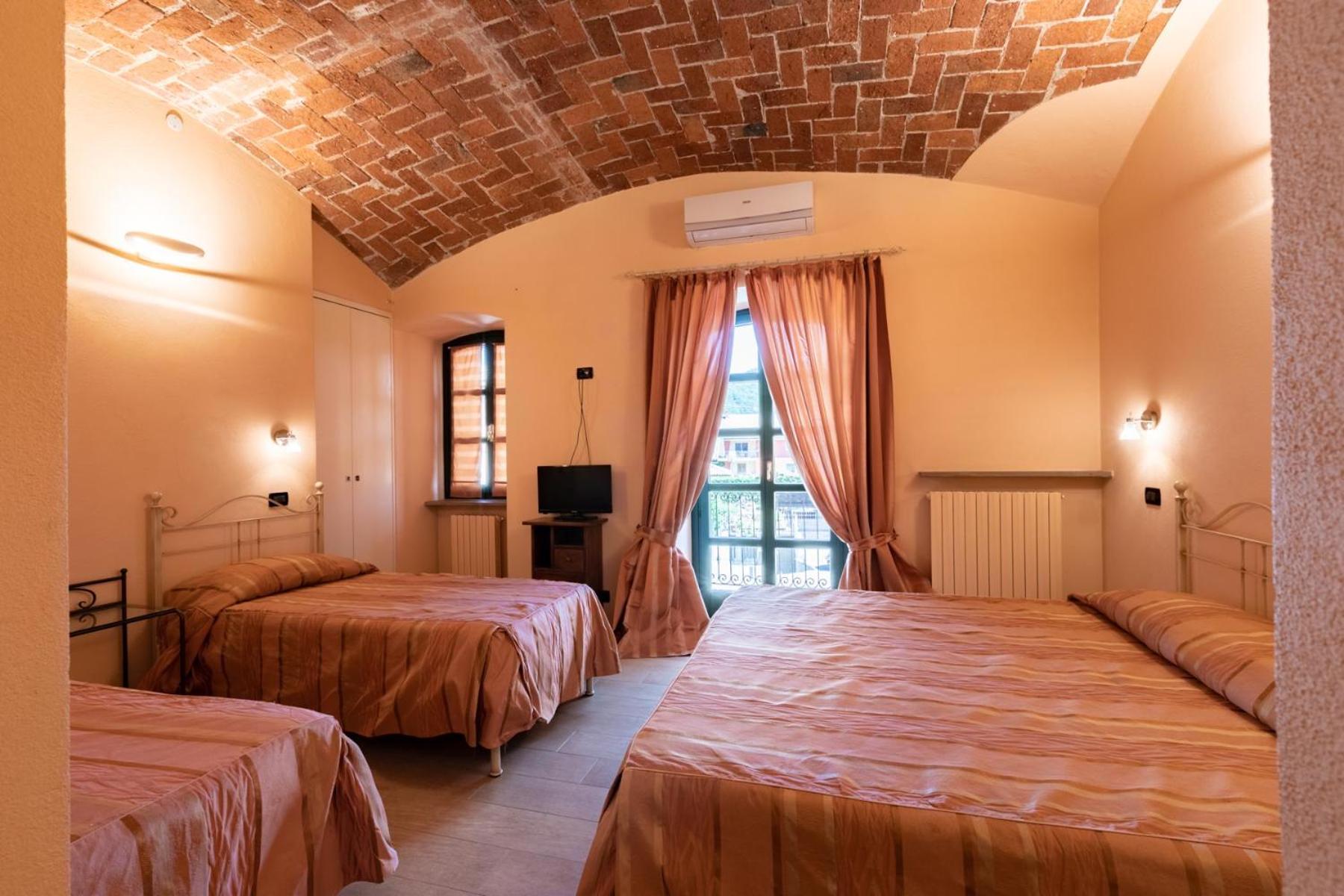 Deluxe Quadruple Room - Photo 4