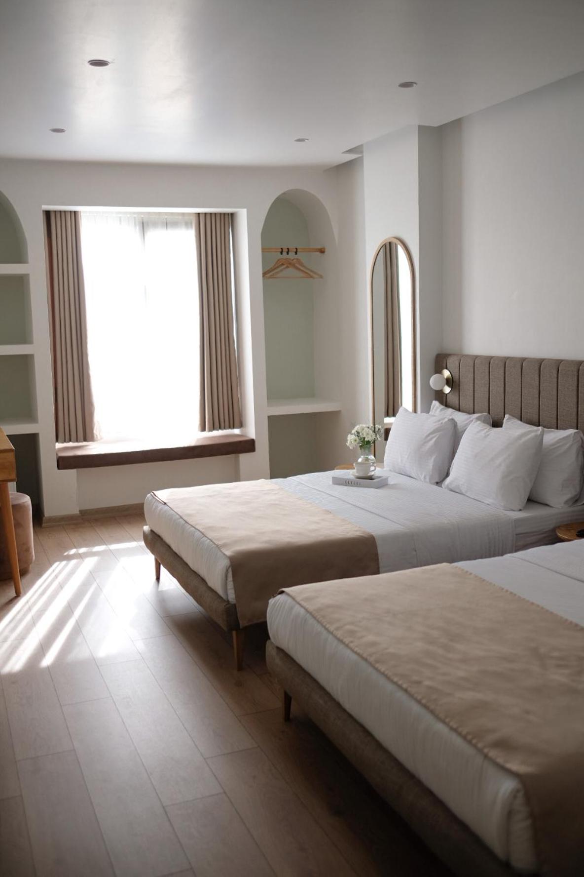 Deluxe Triple Room - Photo 1