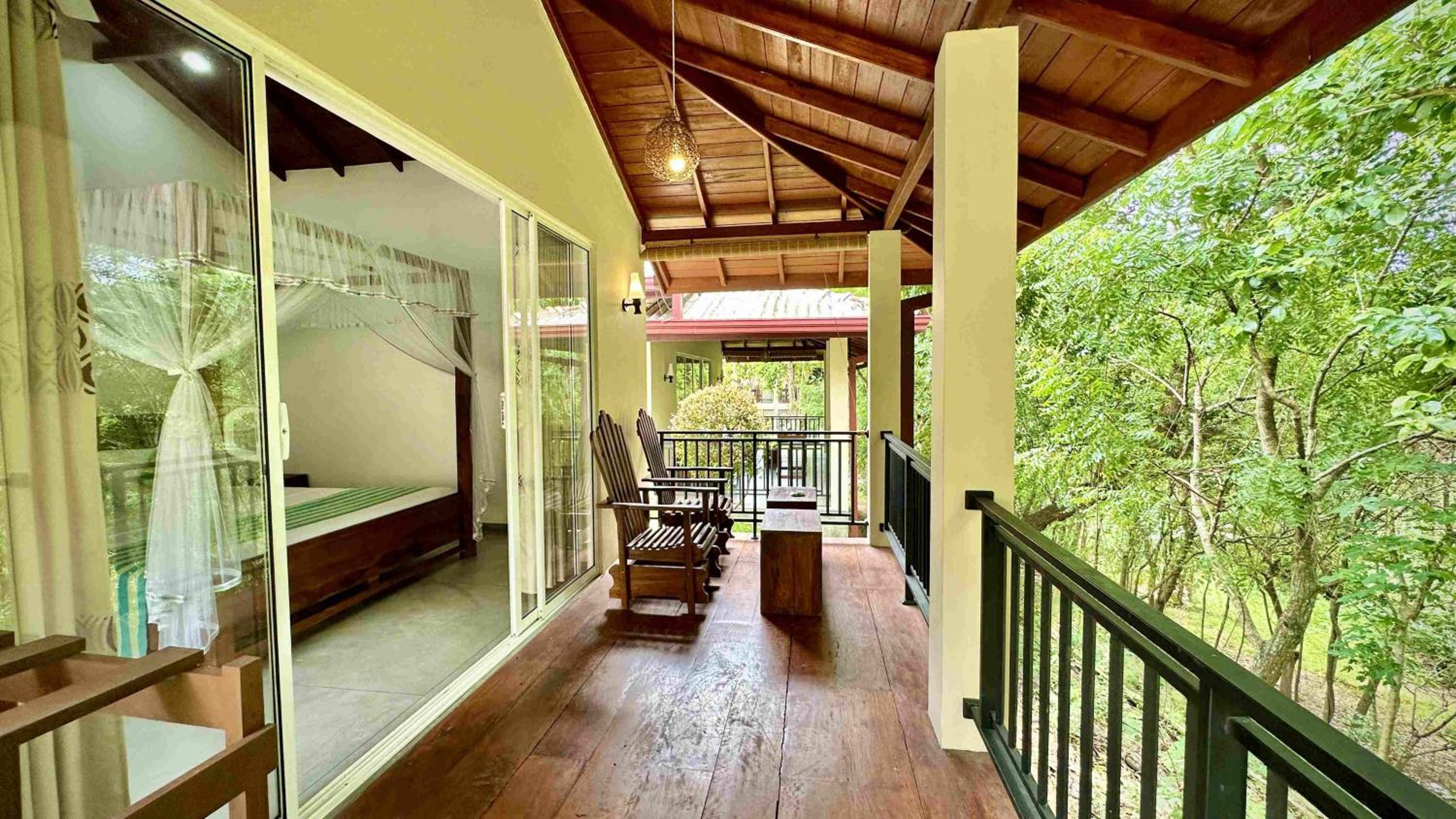 Family Room with Balcony - Photo 2