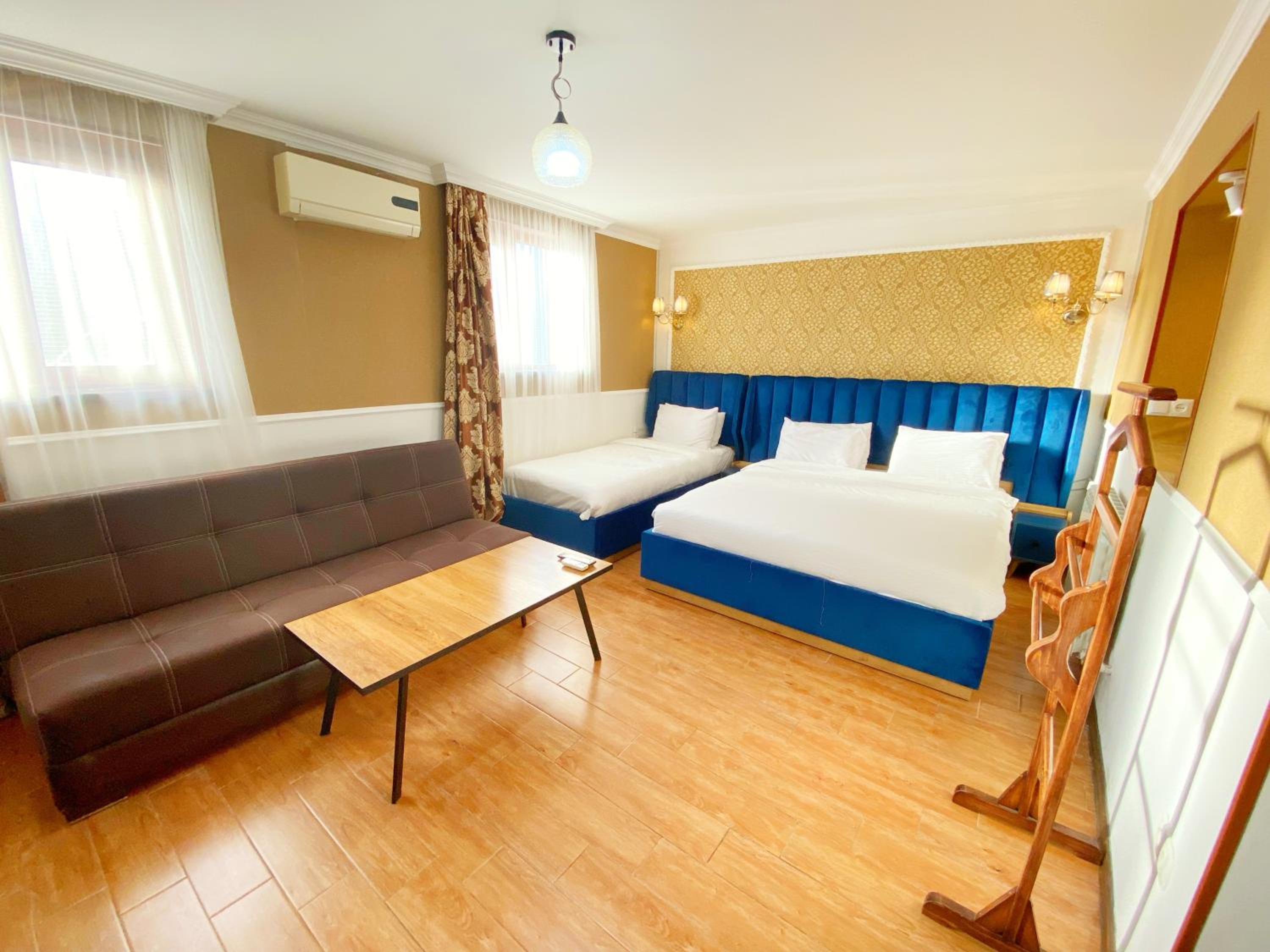 Triple Room - Photo 1