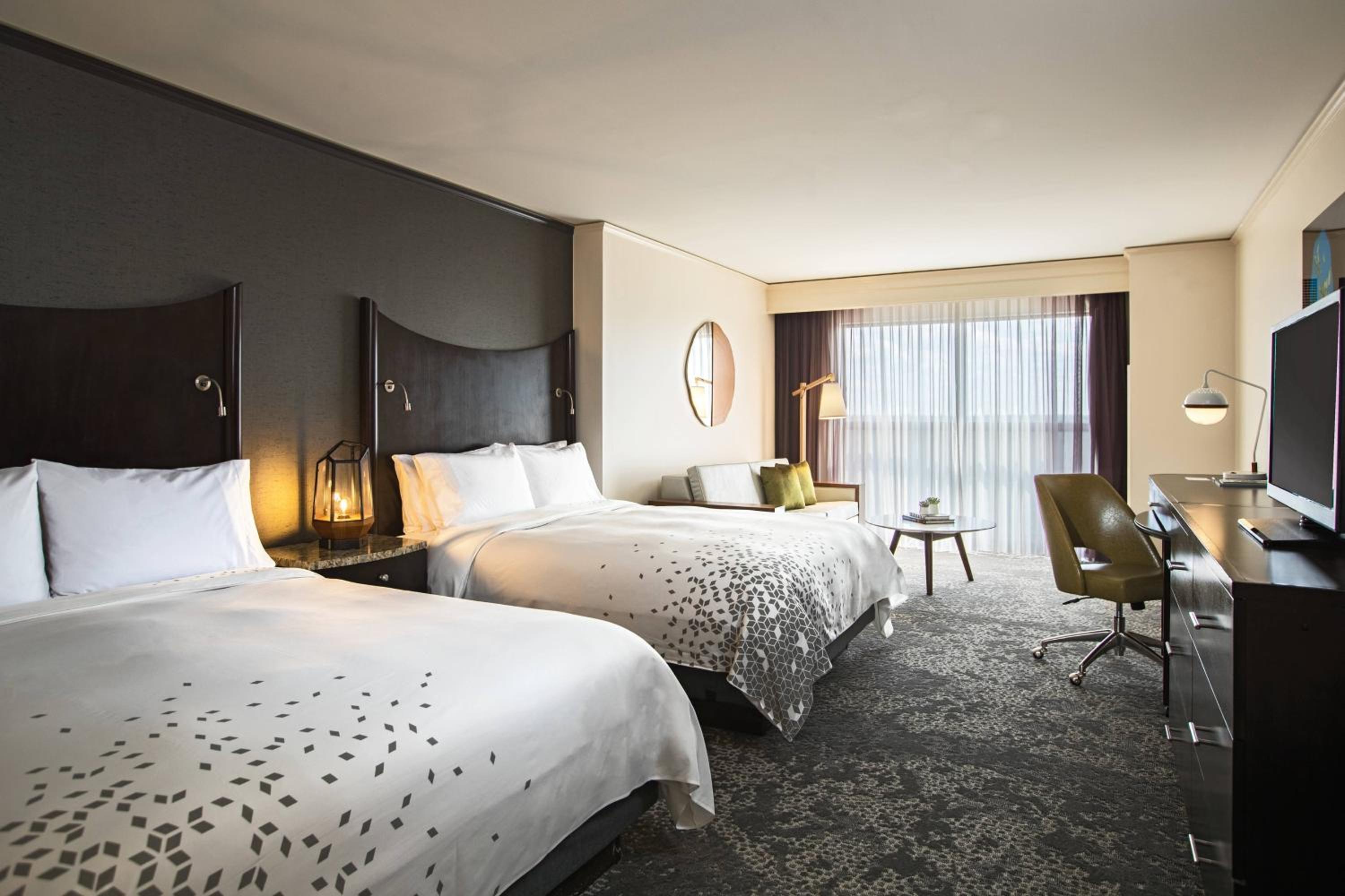 Queen Room with Two Queen Beds and Sofa Bed - Photo 1