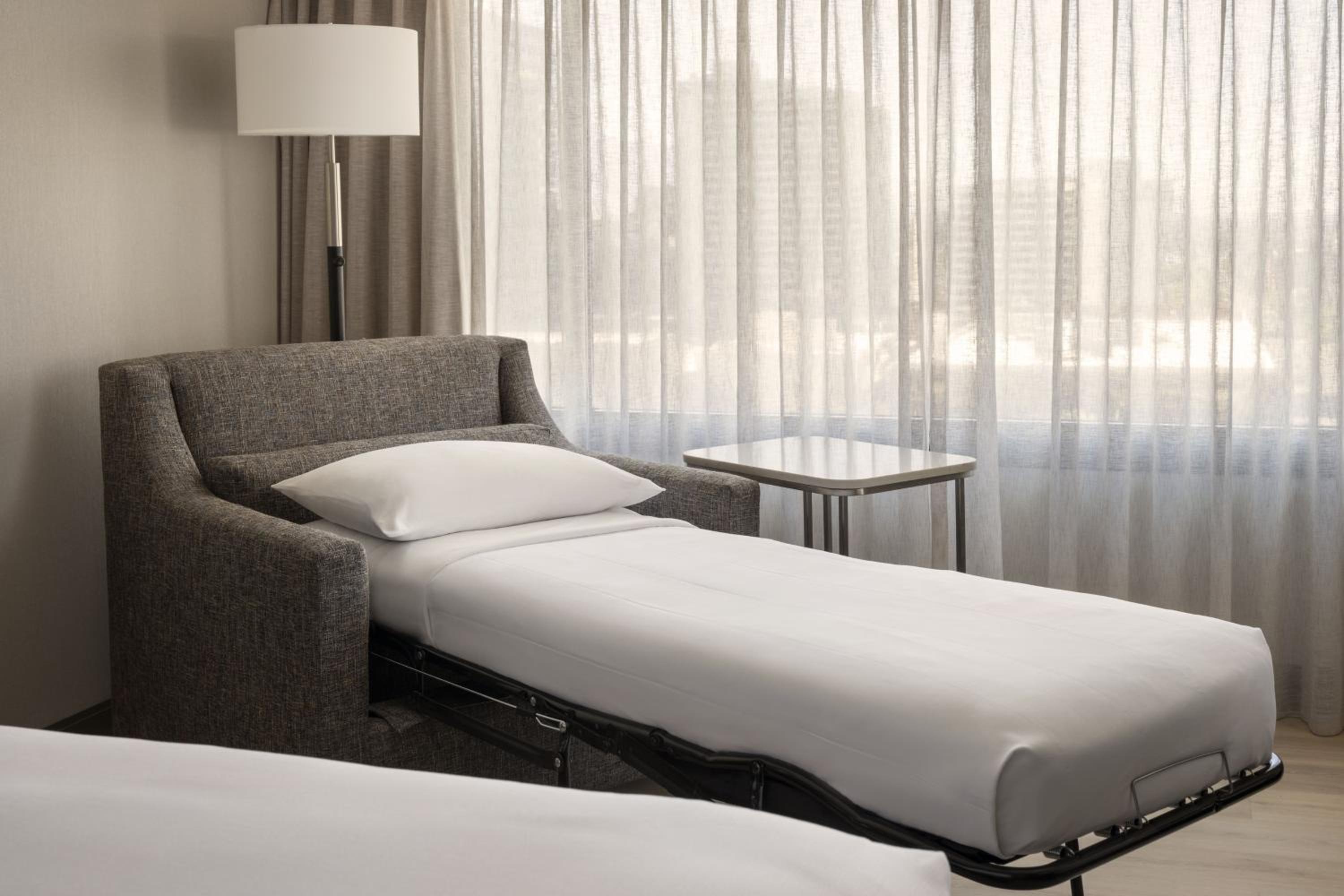 Larger Guest Room, 1 King Bed, Corner Room - Photo 9