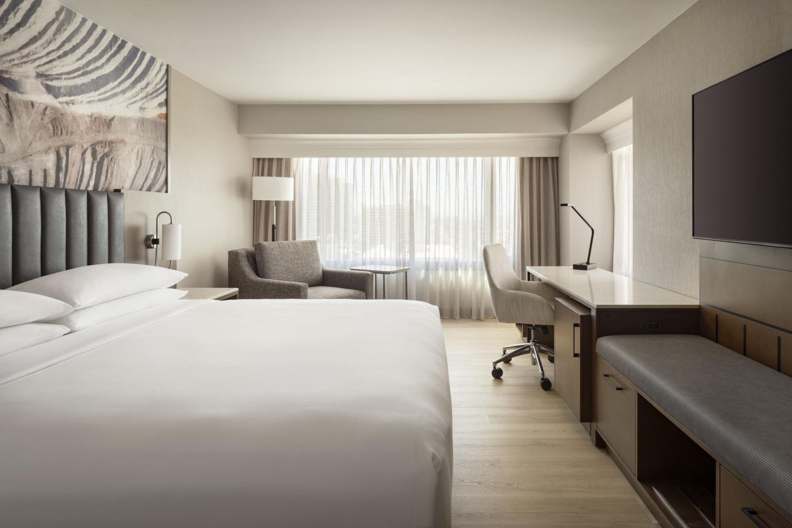 Larger Guest Room, 1 King Bed, Corner Room - Photo 1