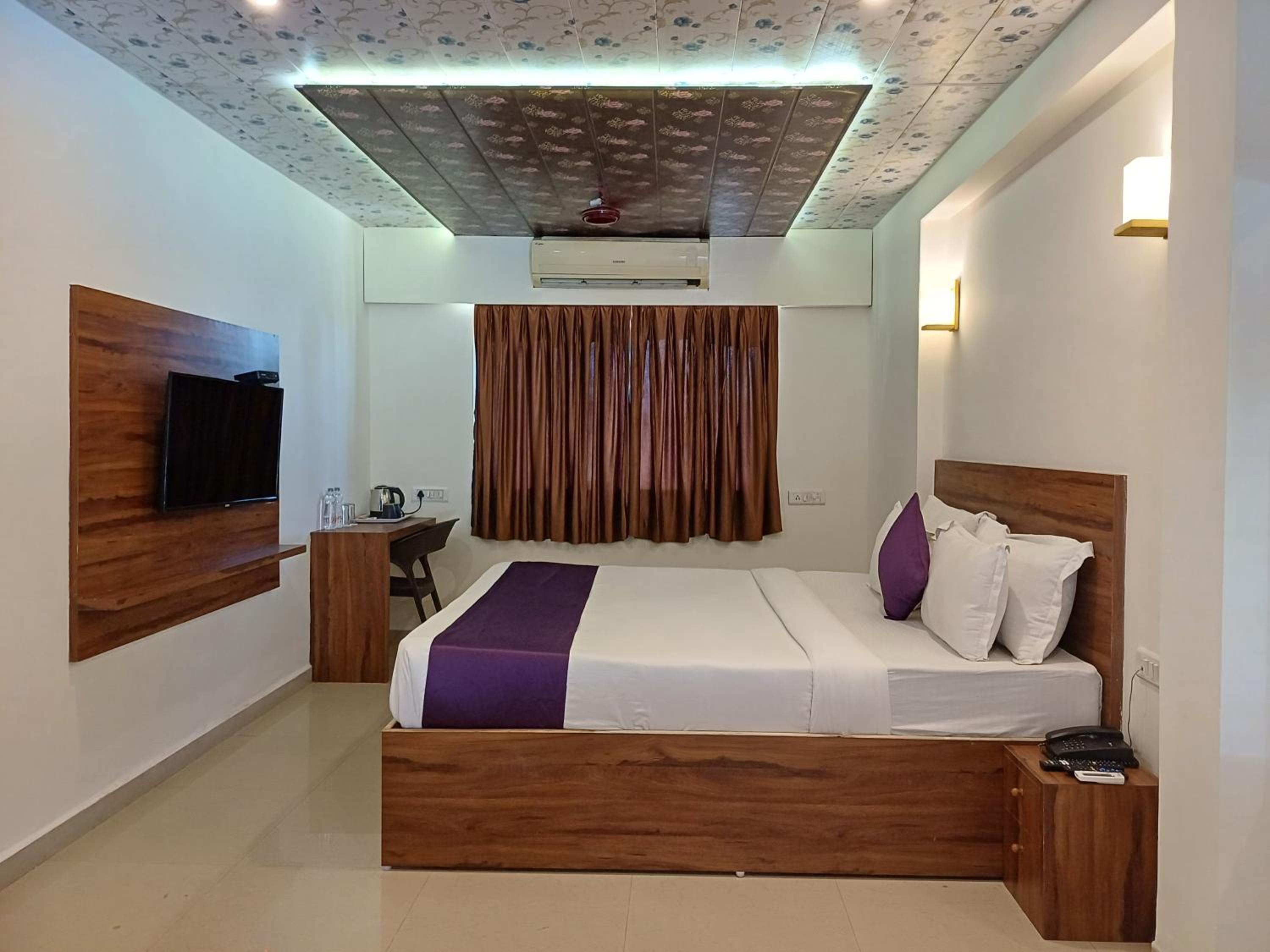 Deluxe Room - Photo 1