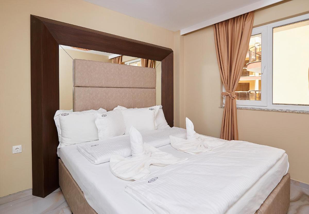 One-Bedroom Apartment with Balcony ( 2 Adults + 2 Children)