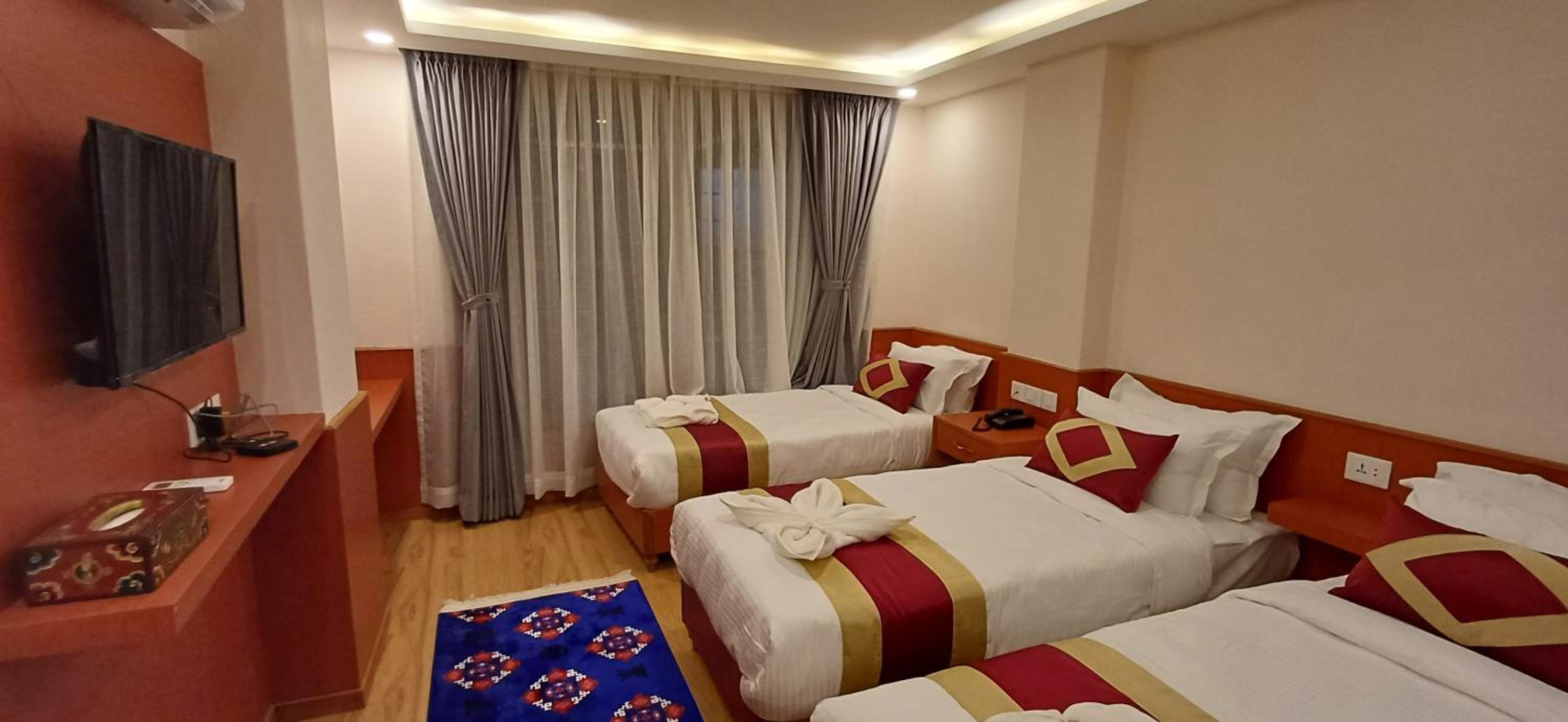 Deluxe Triple Room