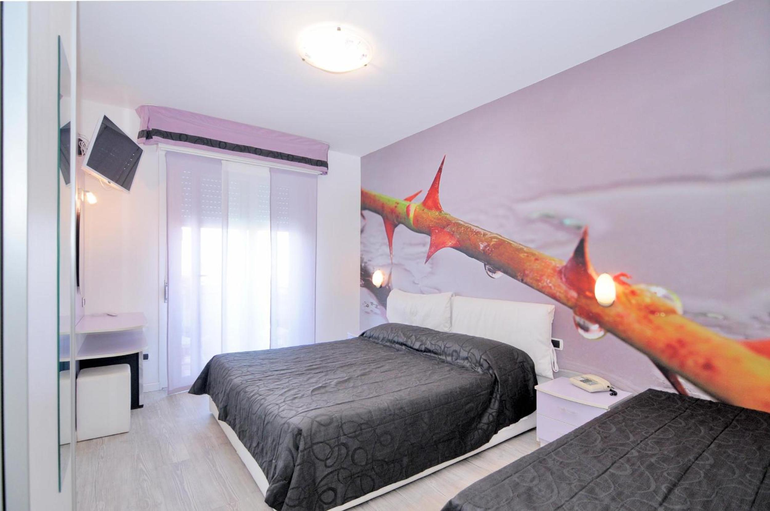 Triple Room (2 Adults + 1 Child)