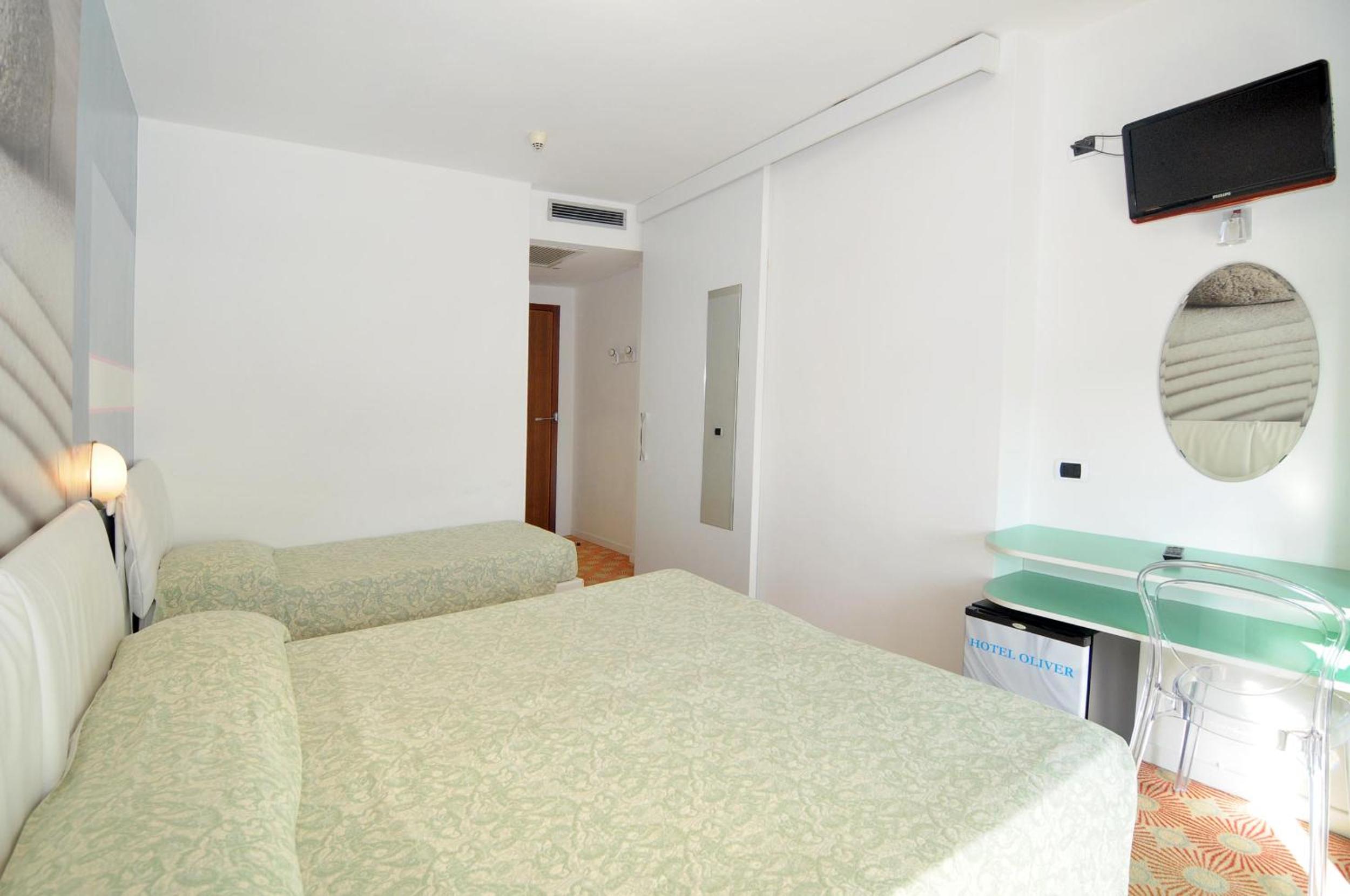 Triple Room (2 Adults + 1 Child) photo 3
