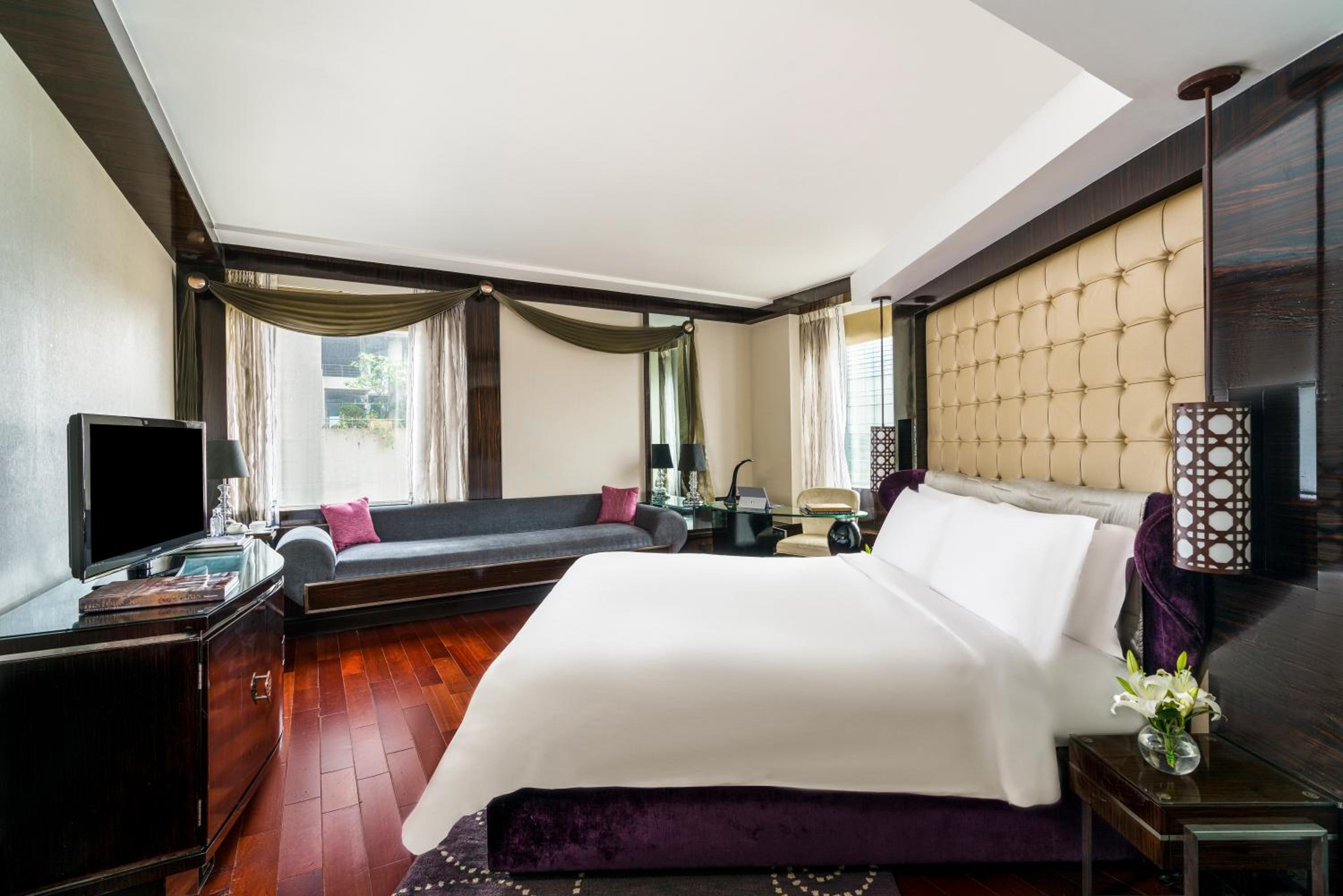 Junior Suite, King Bed with Lounge Access, Breakfast, Hi-tea, Cocktail Hours, Meeting Room access for an Hour, Airport Transfers (T1 & T2)