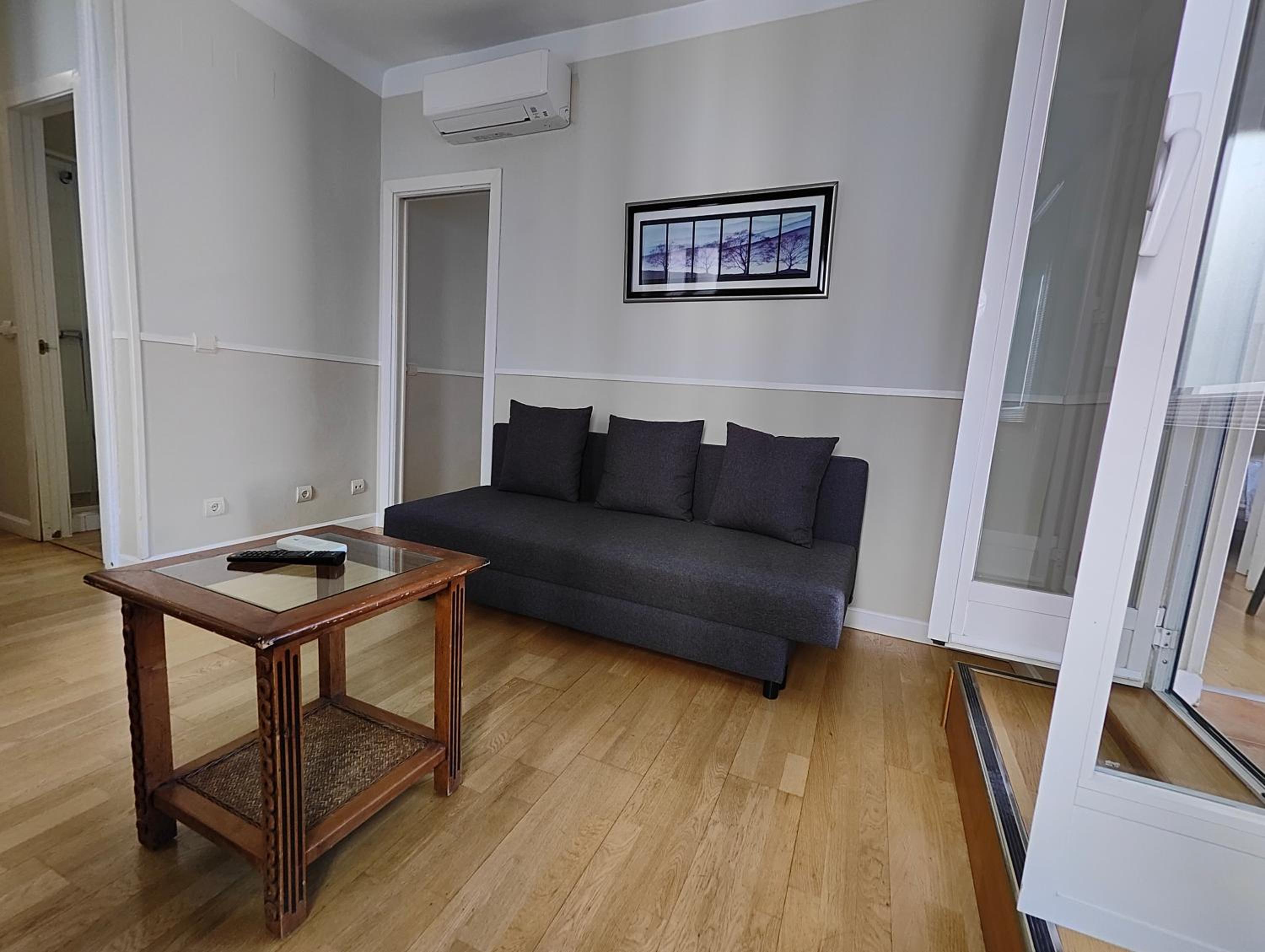 Three-Bedroom Apartment with Terrace - Photo 11