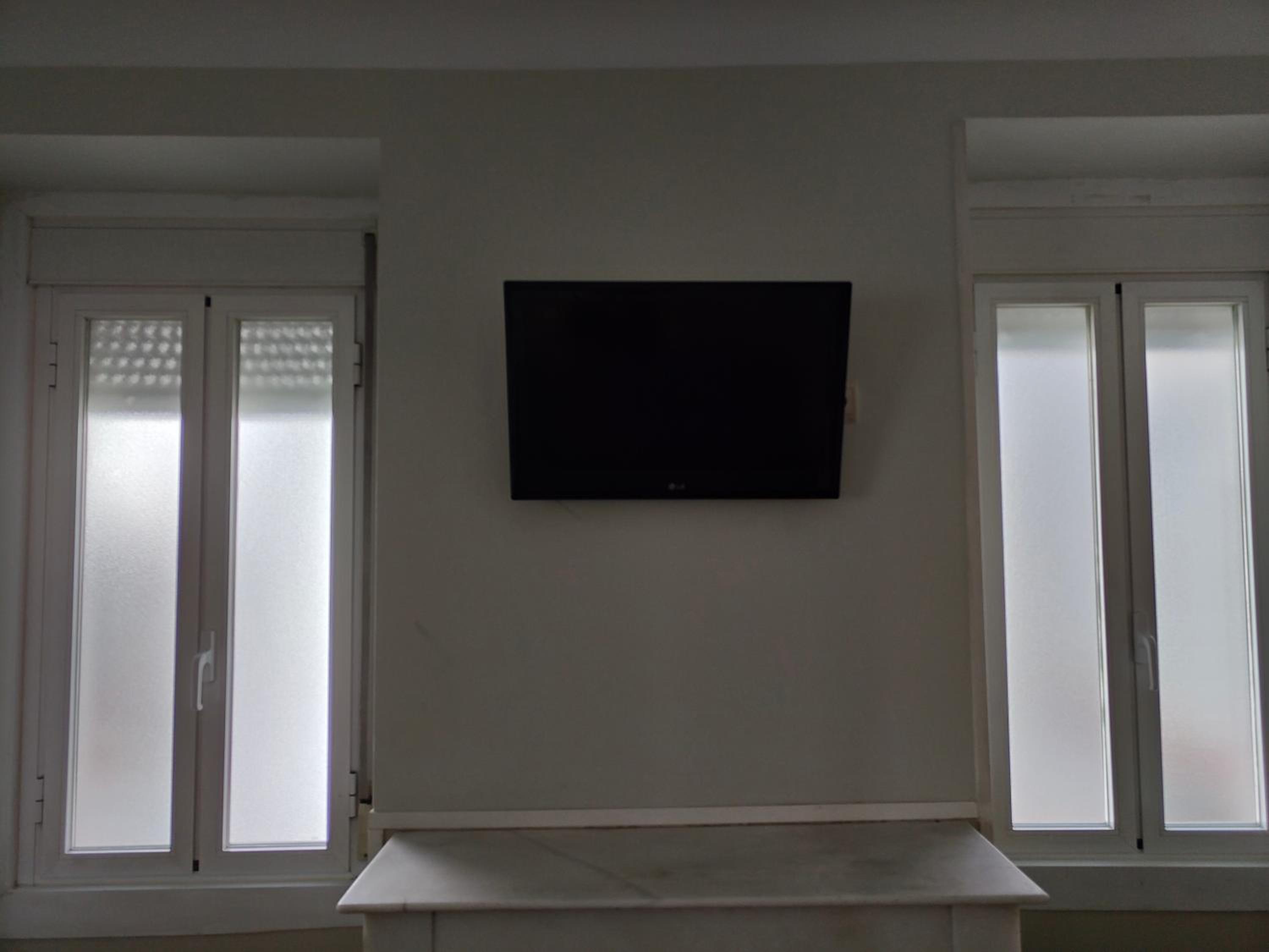 Three-Bedroom Apartment with Terrace - Photo 8