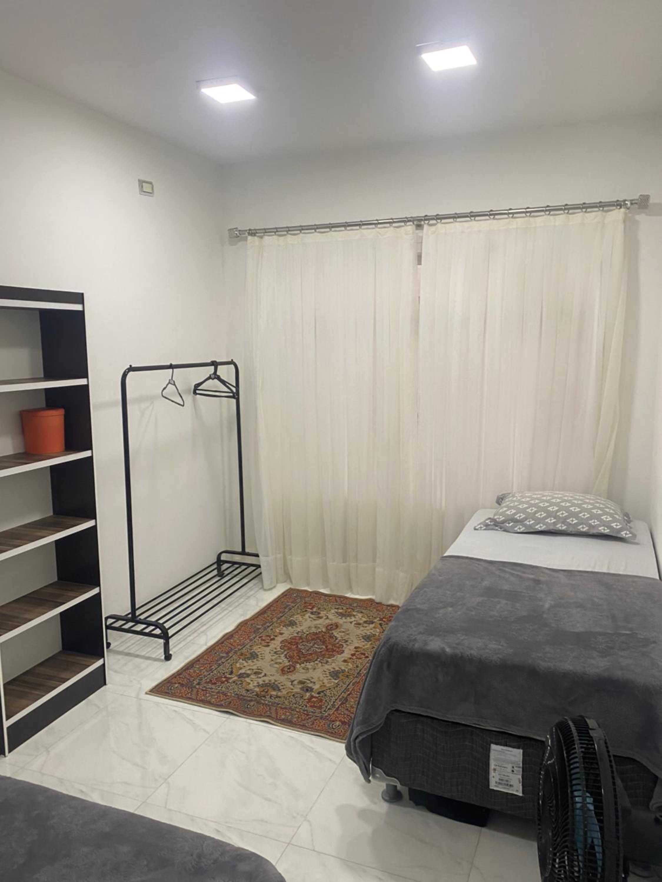 Basic Triple Room With Shared Bathroom photo 1
