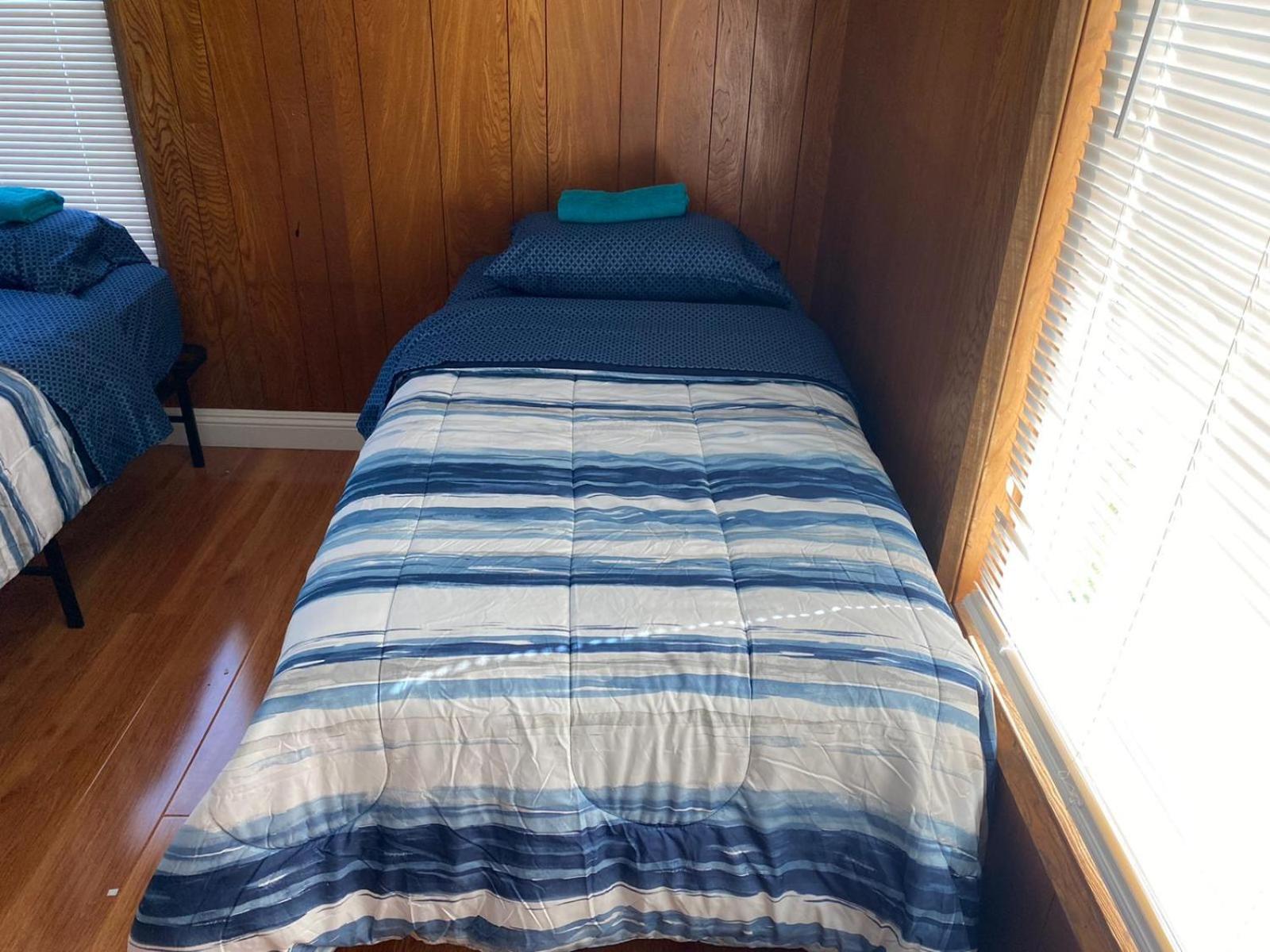 Single Bed in Dormitory Room