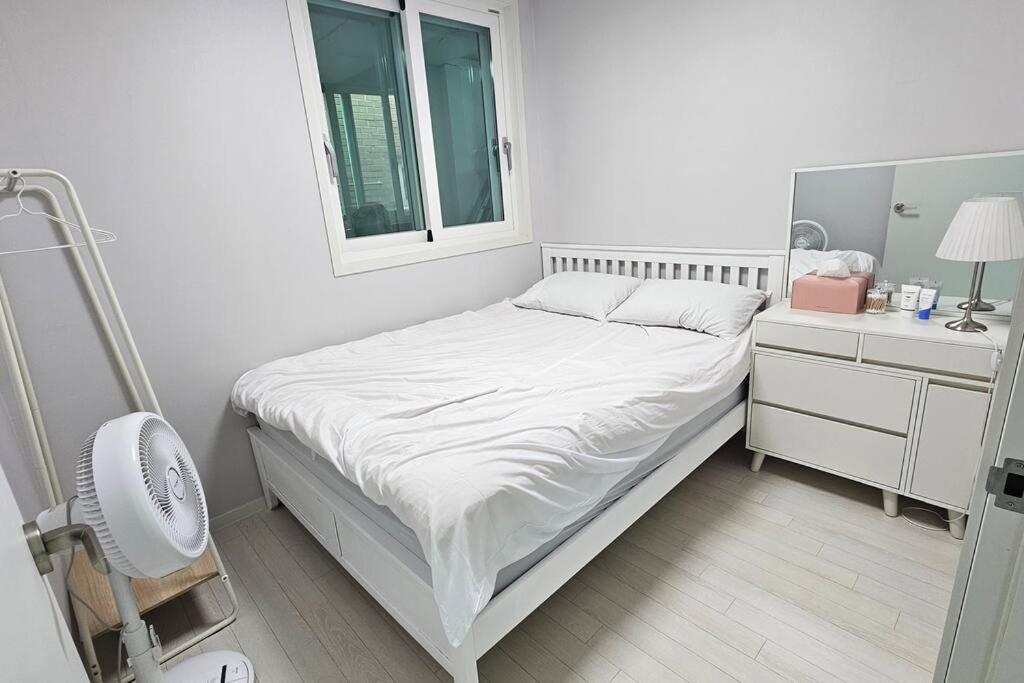 Three-Bedroom Apartment photo 1