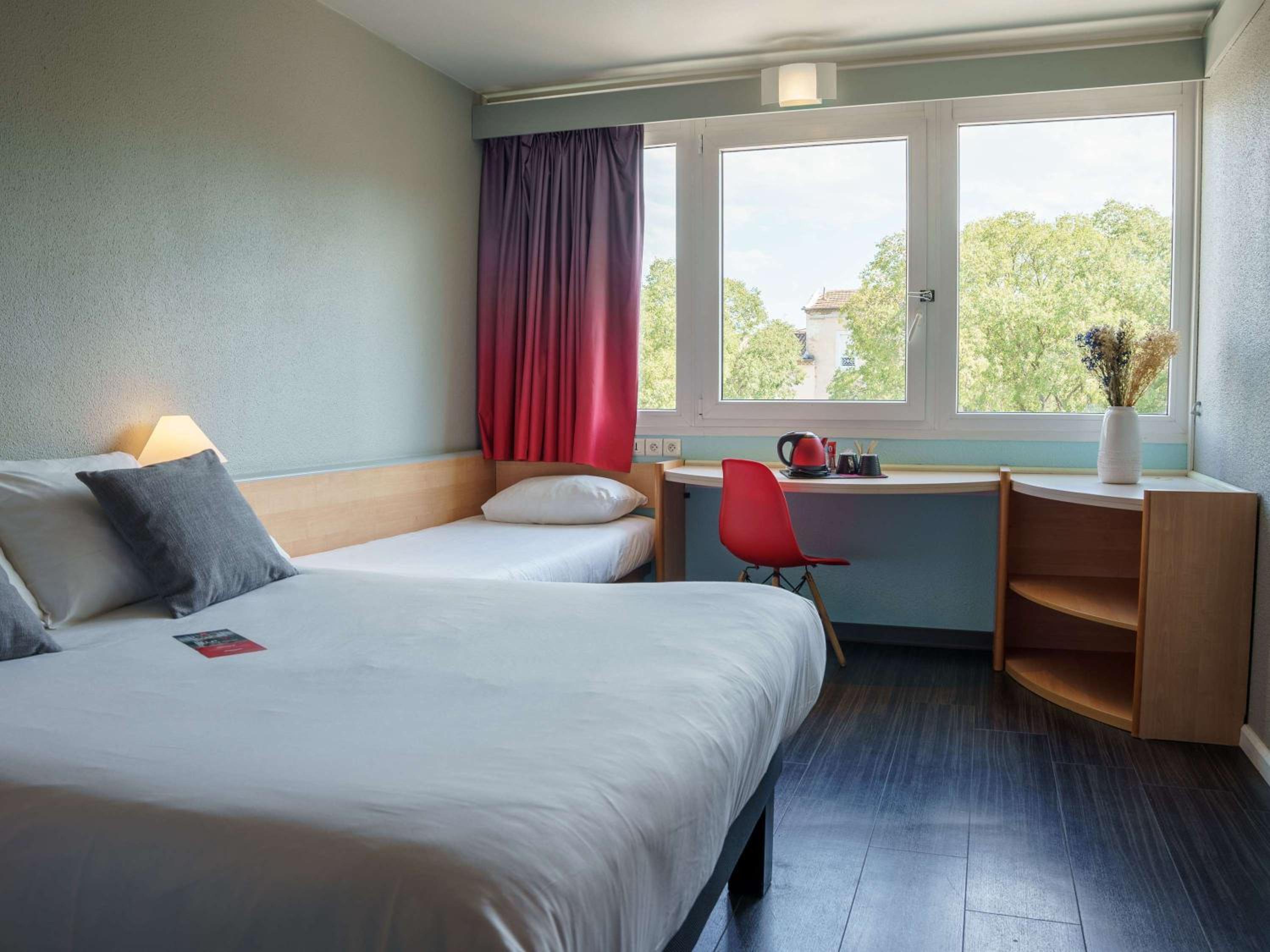 Standard Room with One Double Bed and One Single Bed - Photo 1