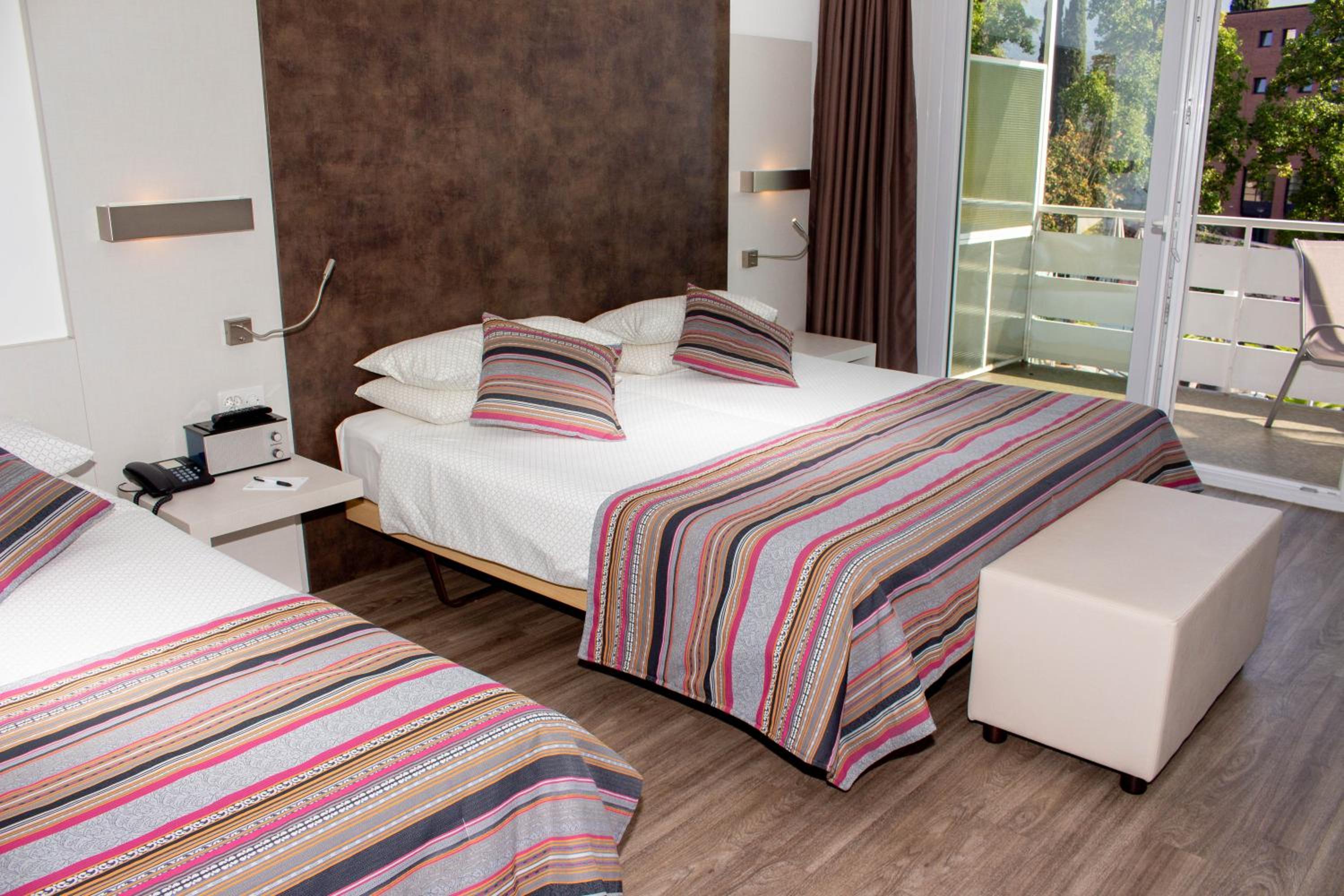 Triple Room with Balcony - Photo 1