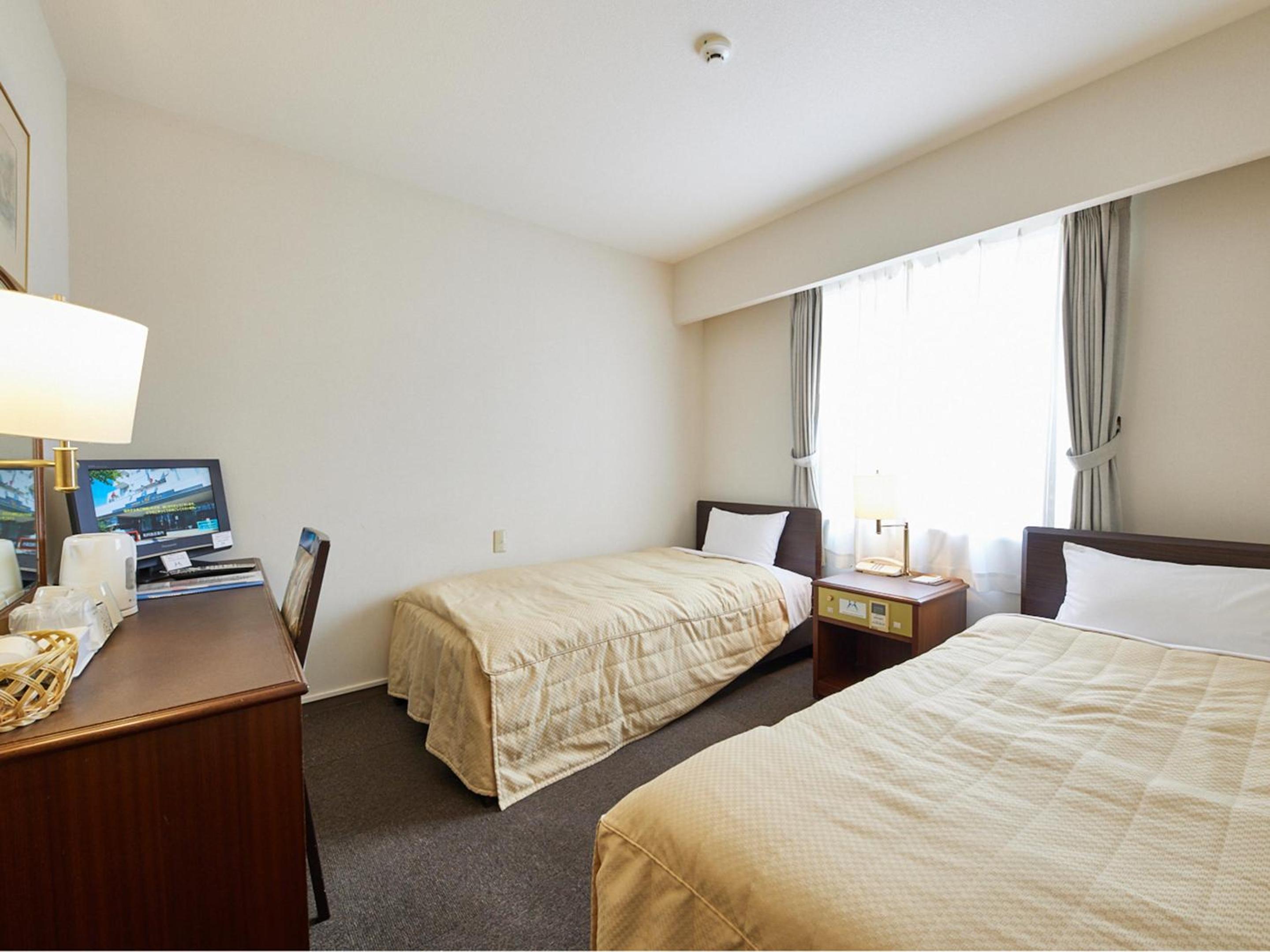 Twin Room - Photo 1