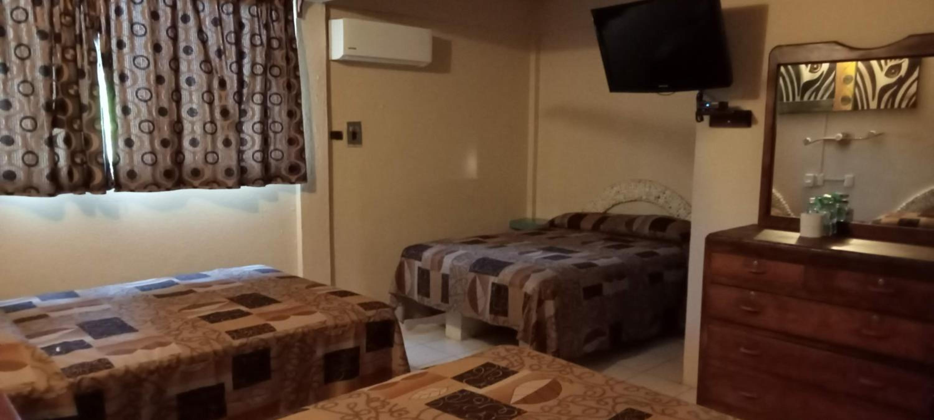 Basic Triple Room With Shared Bathroom