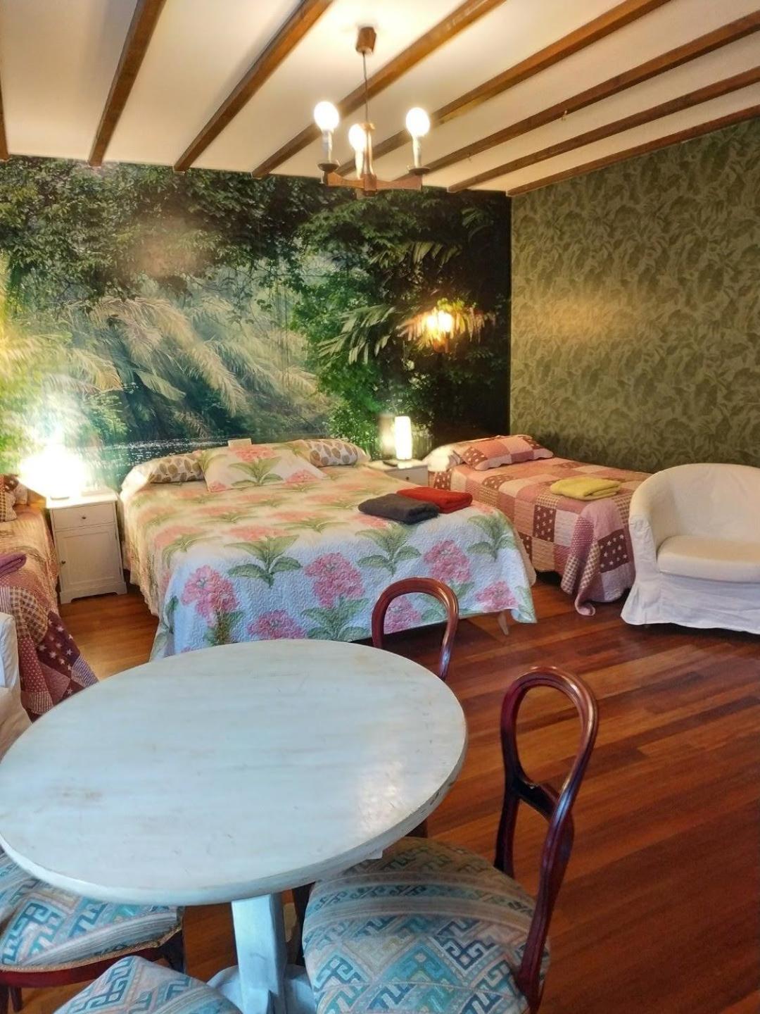 Habitación Cuádruple con Vista al Jardín