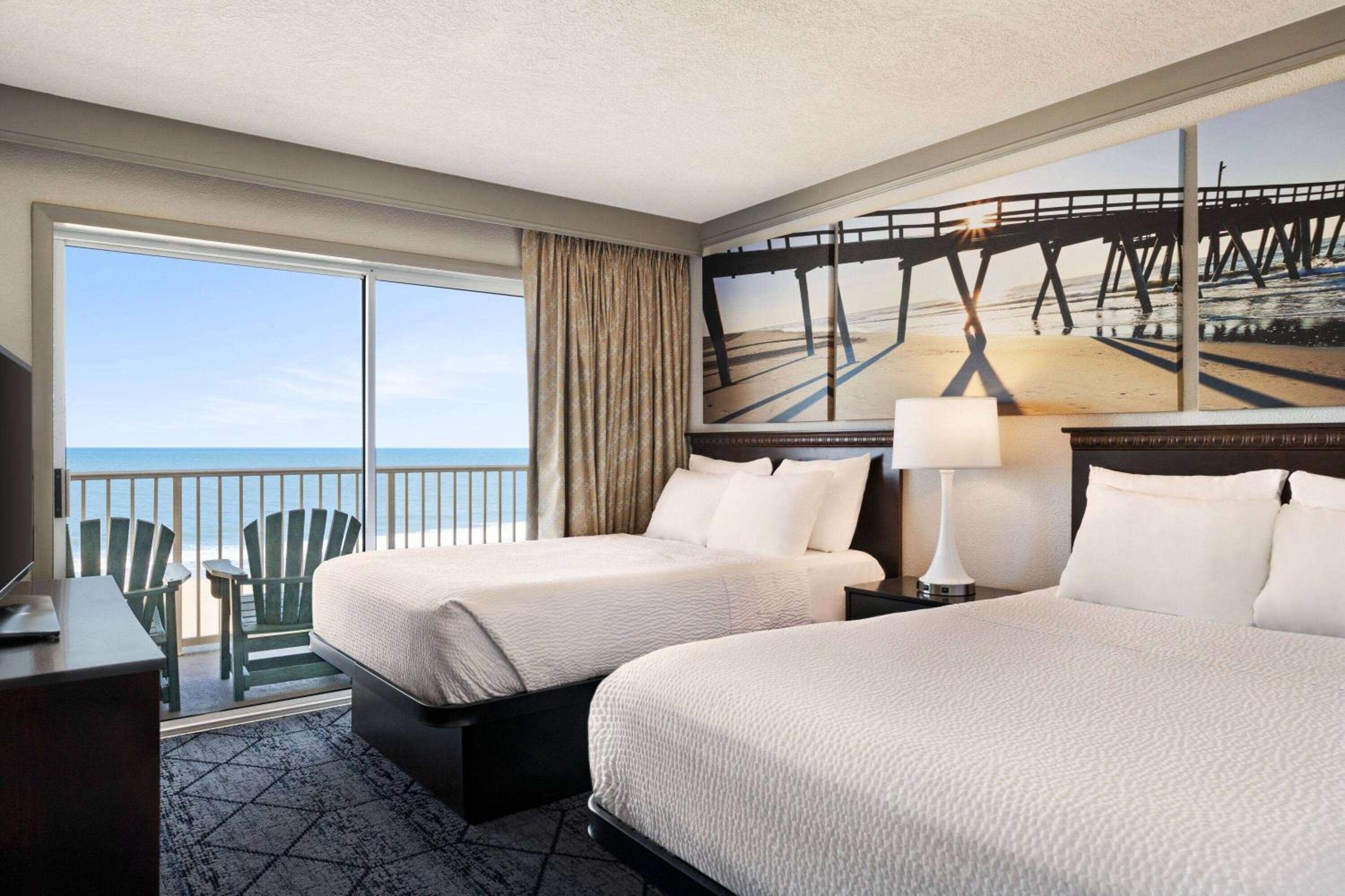 Two-Bedroom Oceanfront Suite with One King Bed and Two Double Beds - Non-Smoking photo 1