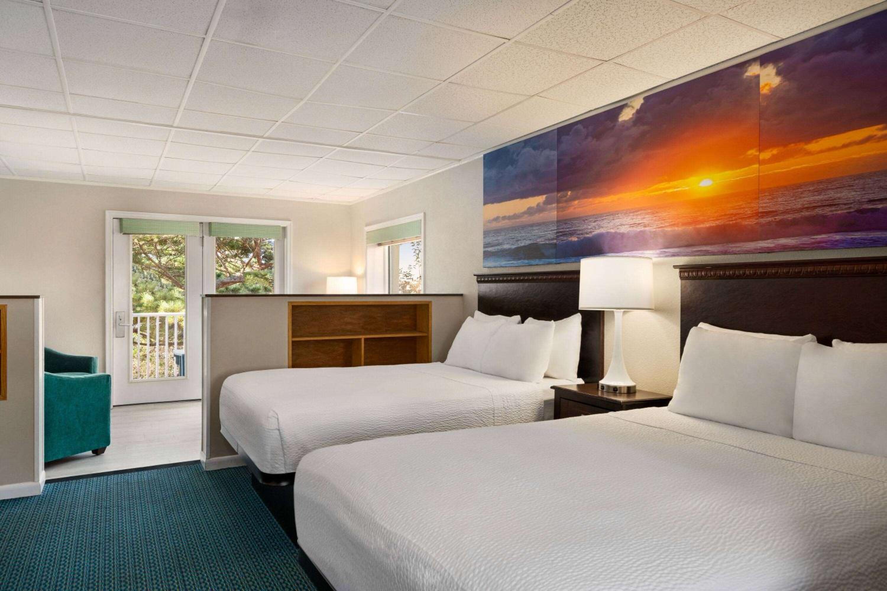 Deluxe Suite with One King Bed and Two Double Beds - Poolside/Non-Smoking