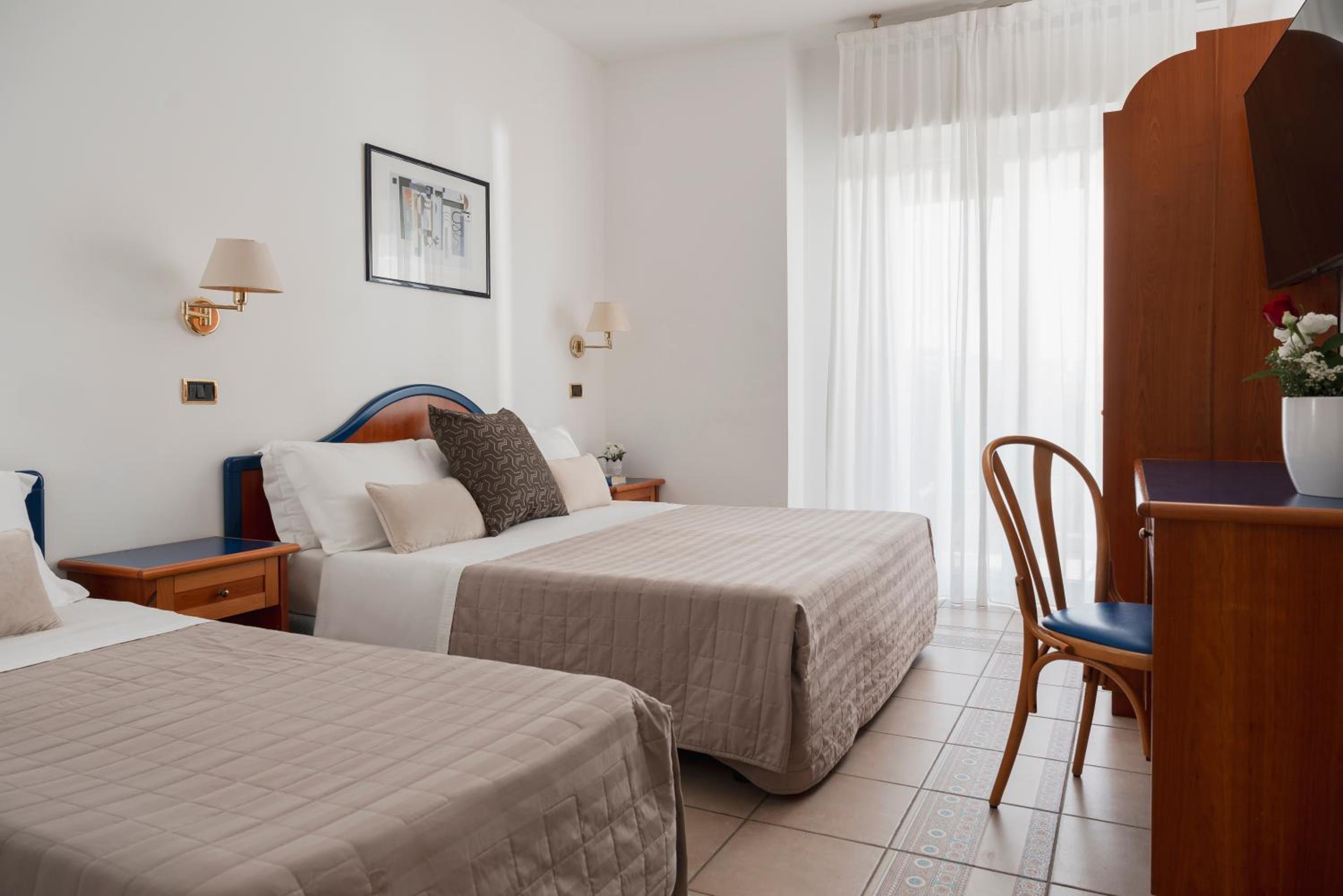 Deluxe Triple Room with Lateral Sea View