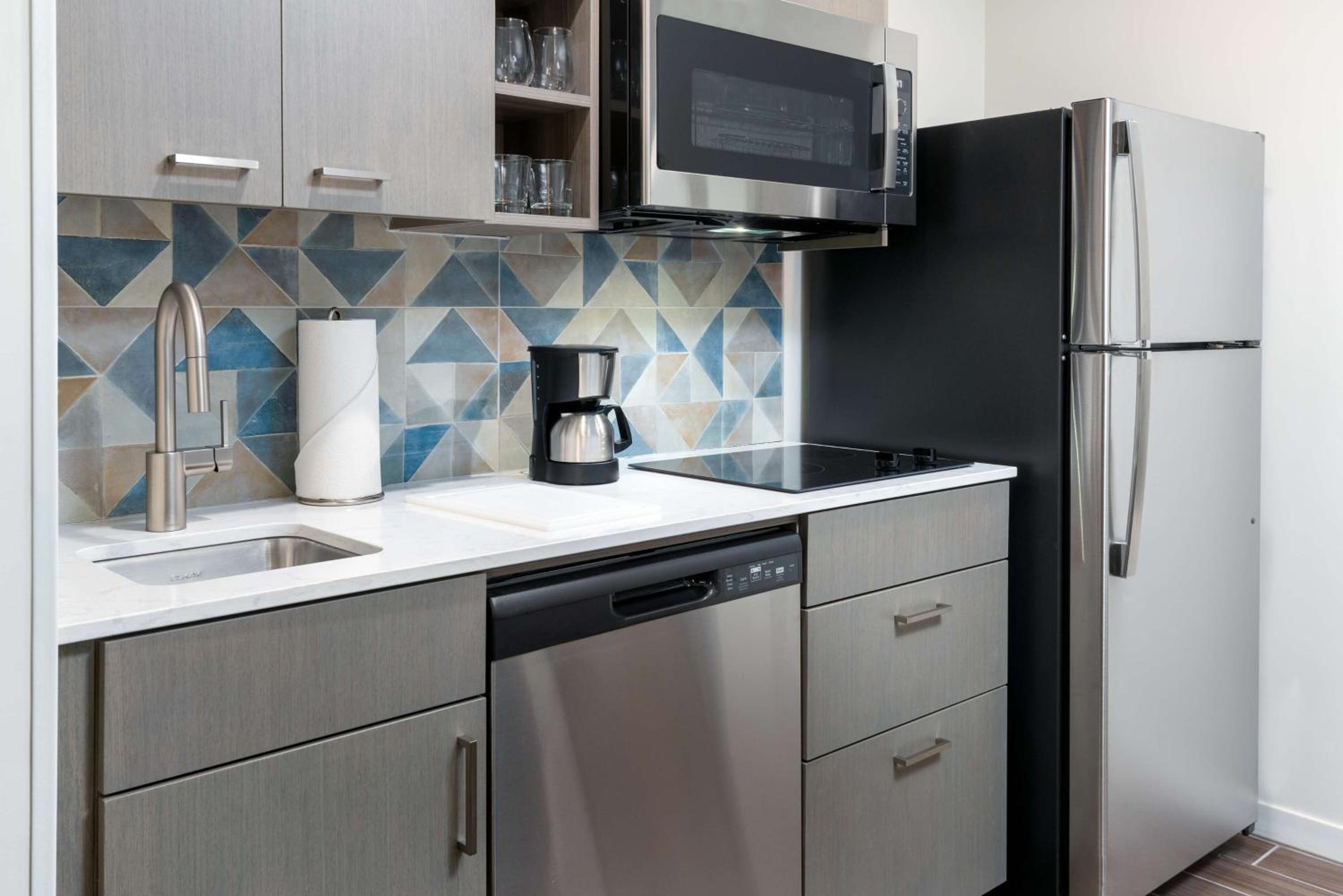 One Bedroom Kitchen Suite with Two Queen Beds and Sofa Bed