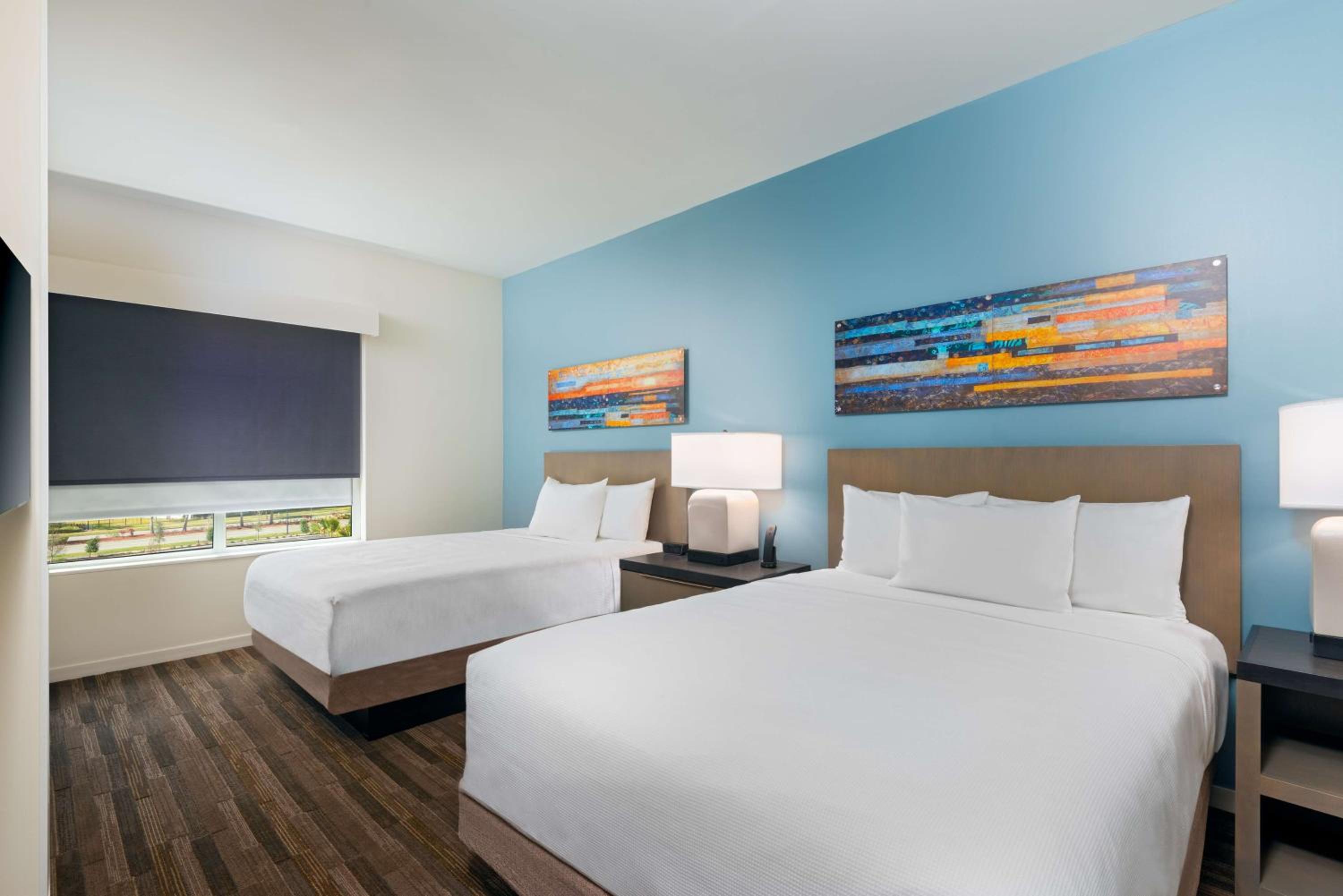 One Bedroom Kitchen Suite with Two Queen Beds and Sofa Bed