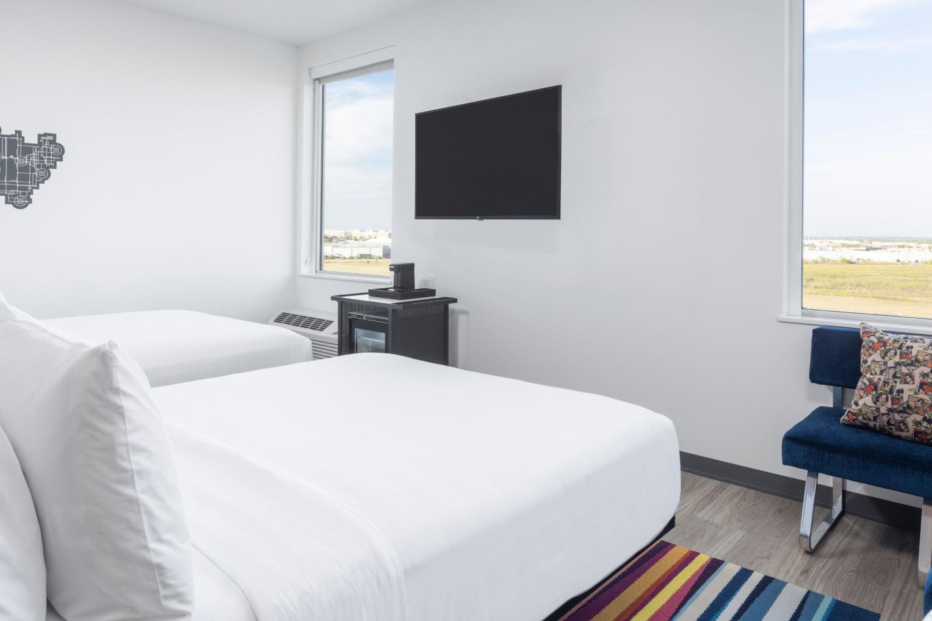 Queen Room with Two Queen Beds - Photo 1