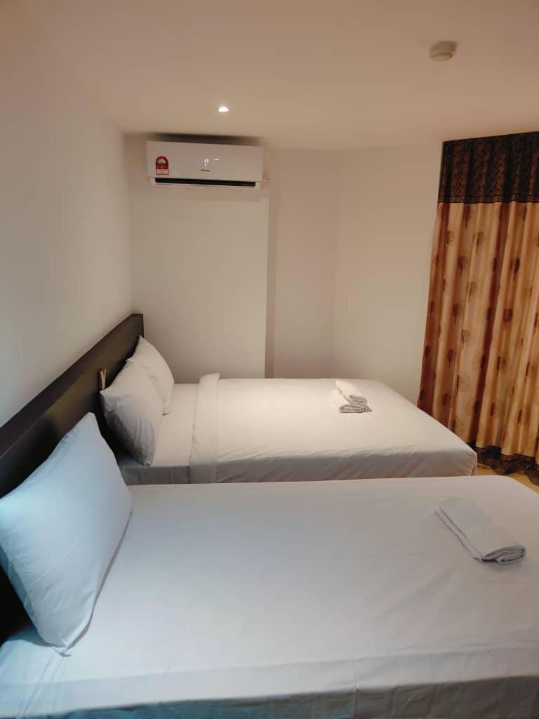 Standard Twin Room - Photo 2