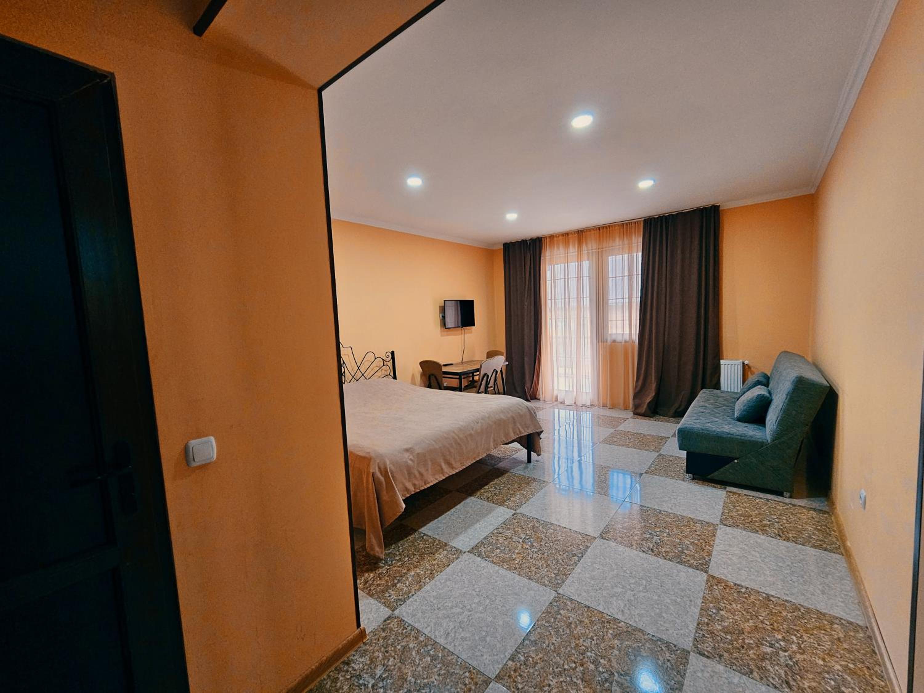 Quadruple Room with Private Bathroom photo 1