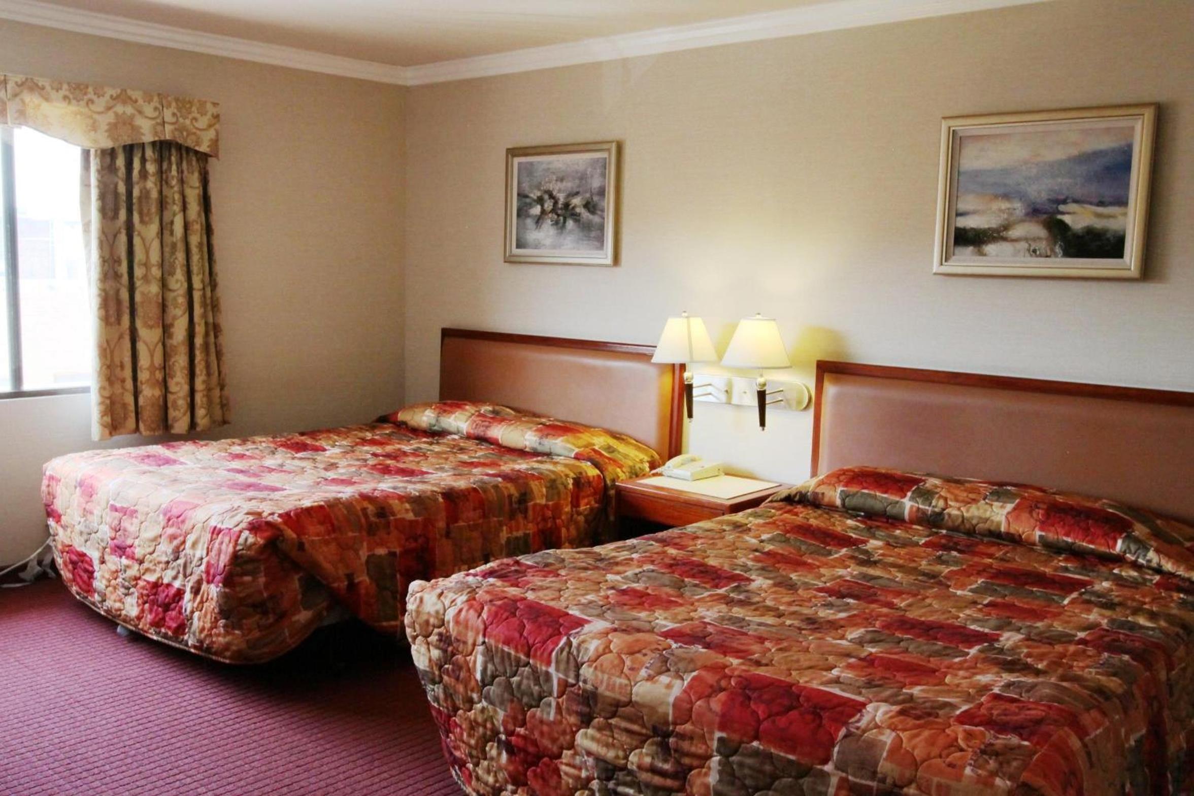Standard Queen Room with Two Queen Beds photo 1
