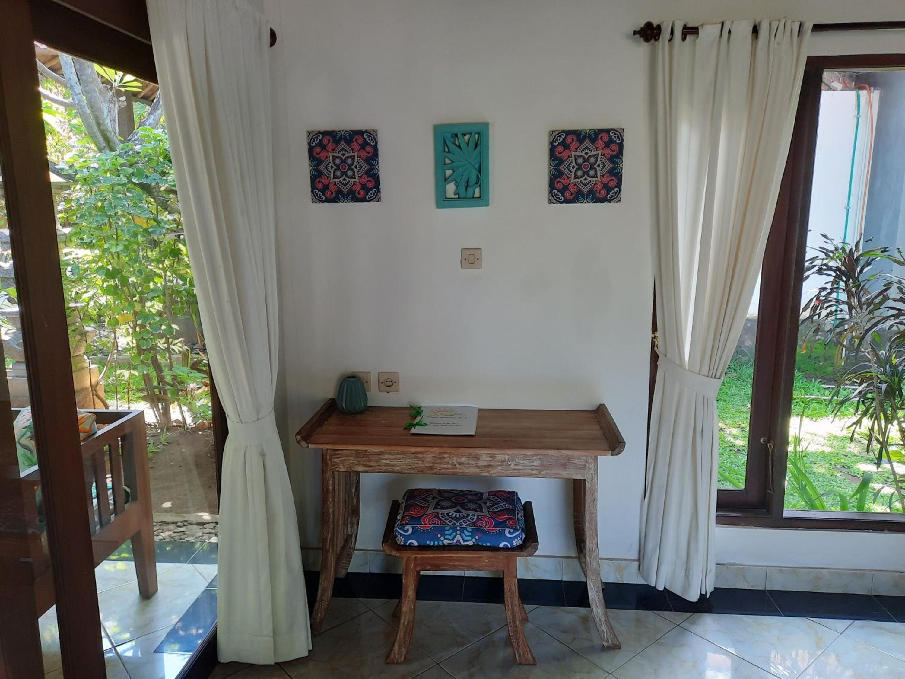Quadruple Room with Garden View - Photo 17