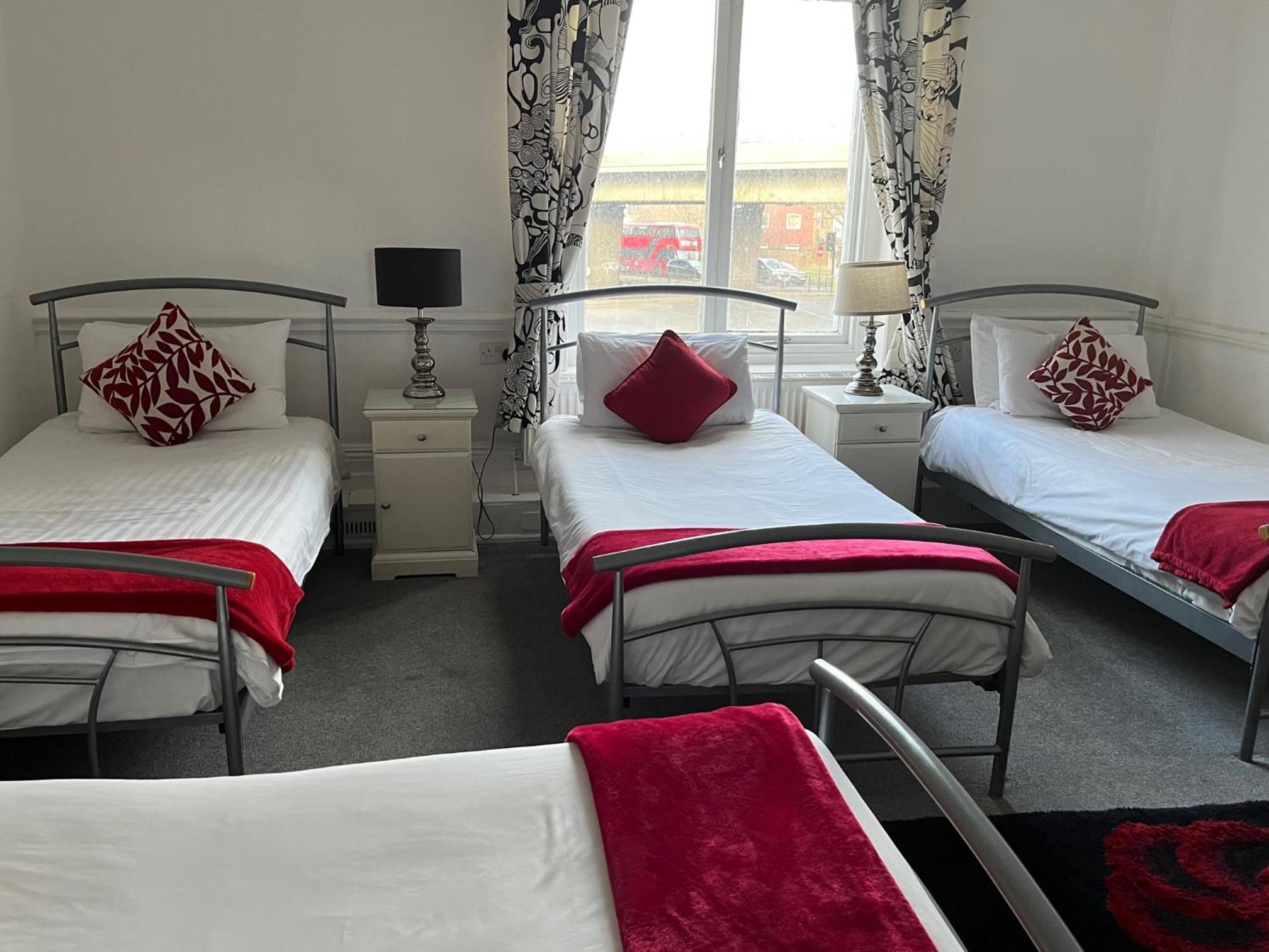 Family Room with Shared Bathroom (4 Adults)