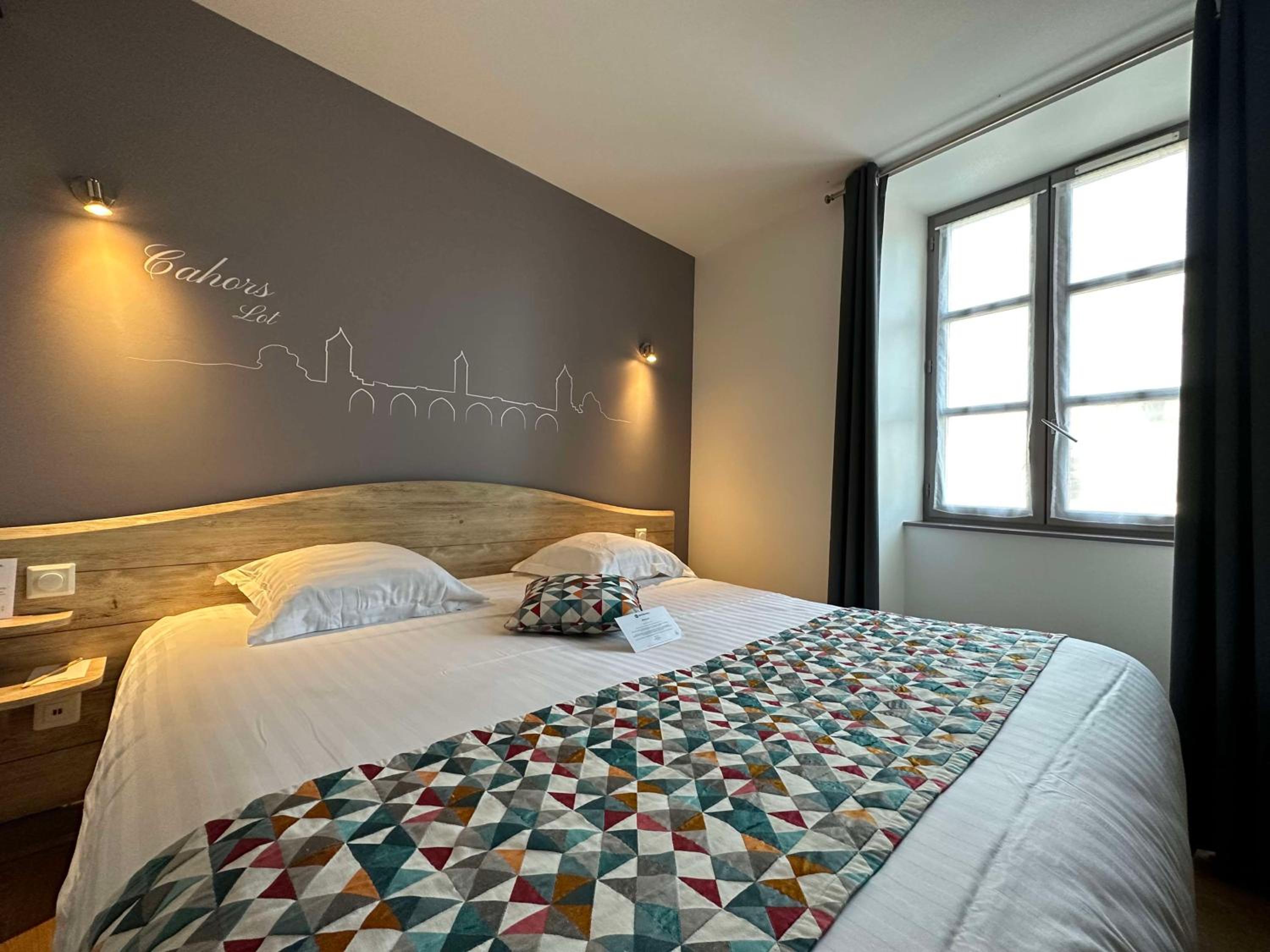 Deluxe Quadruple Room with Queen Bed and Kitchen