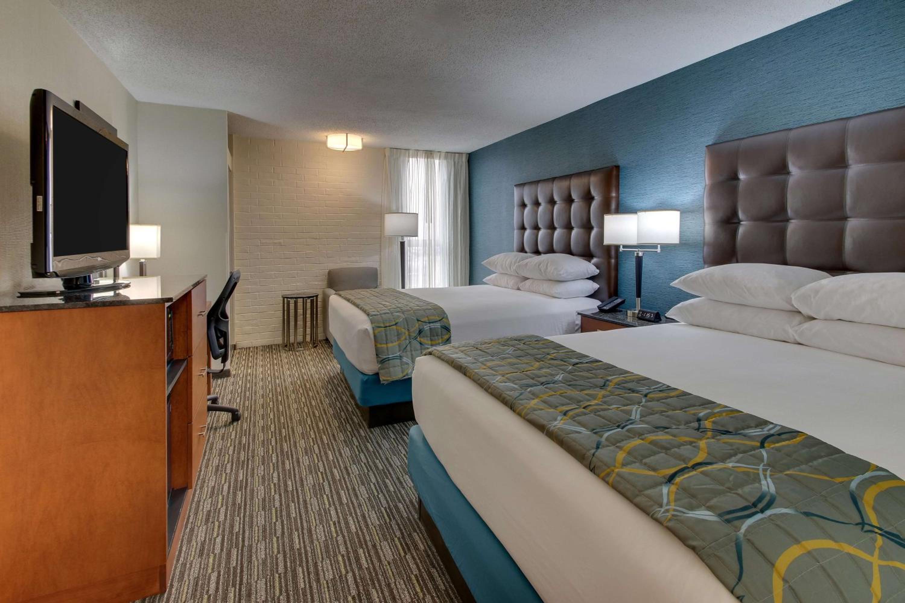 Deluxe Queen Room with Two Queen Beds - Photo 1