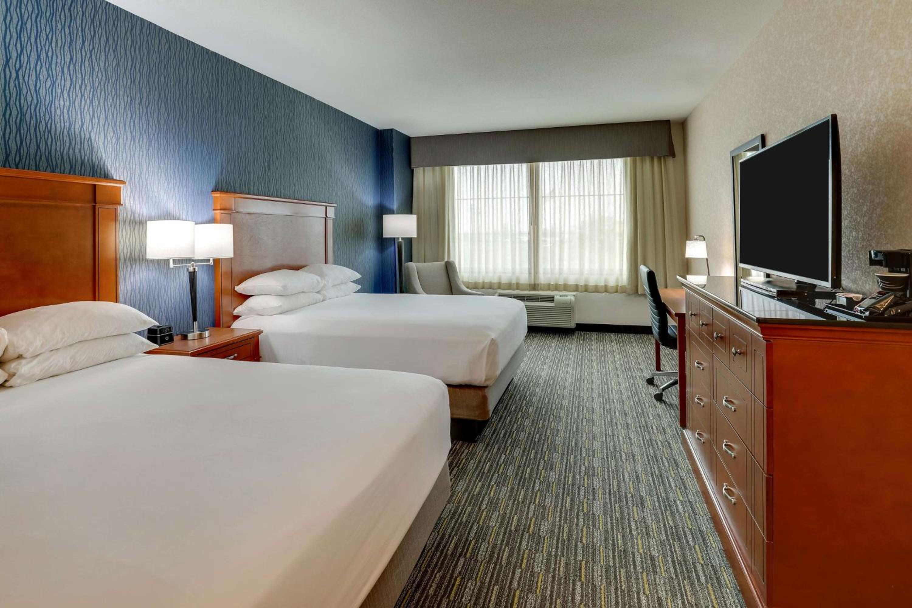 Deluxe Queen Room with Two Queen Beds - Photo 1