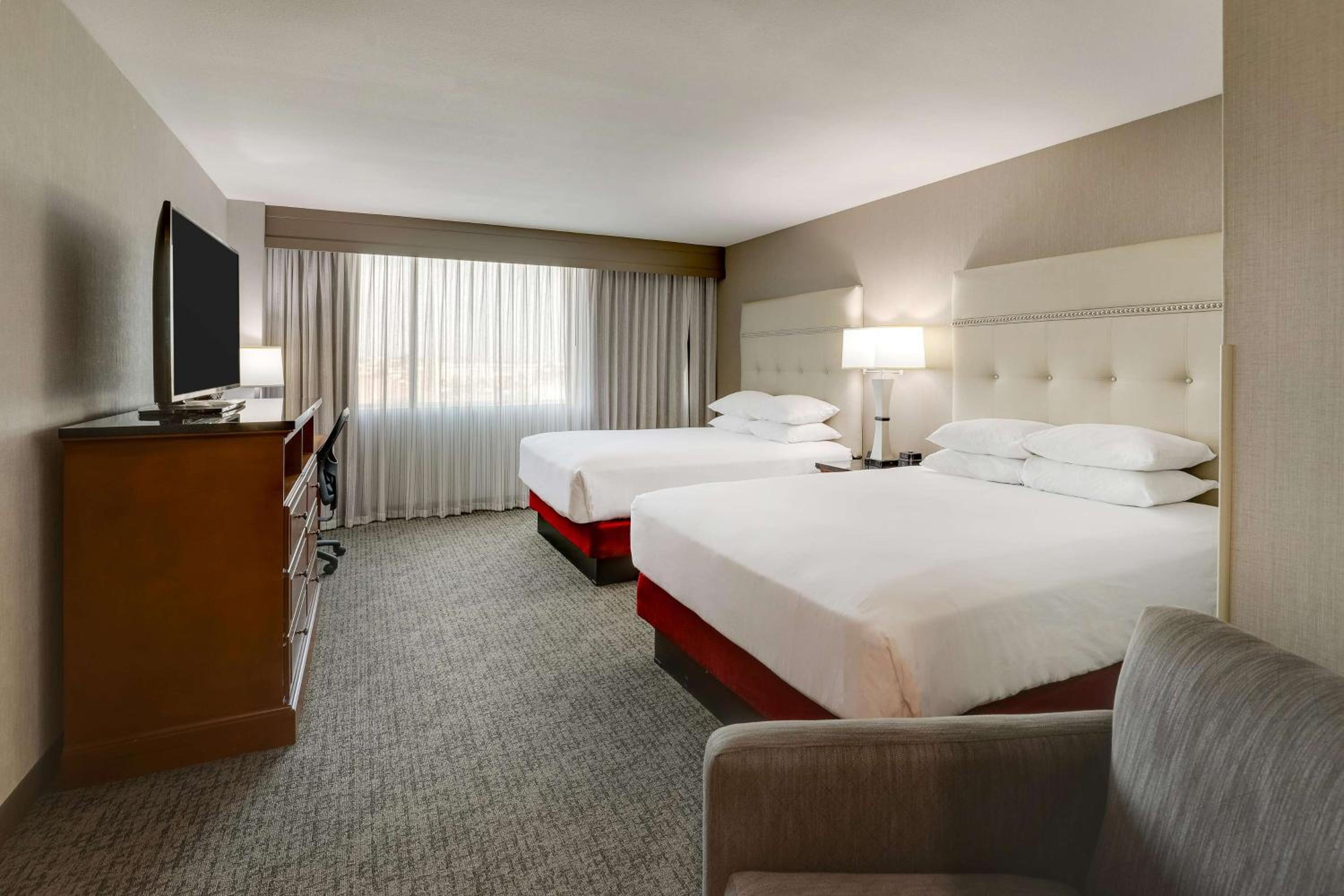 Deluxe Queen Room with Two Queen Beds - Hearing Accessible - Photo 1