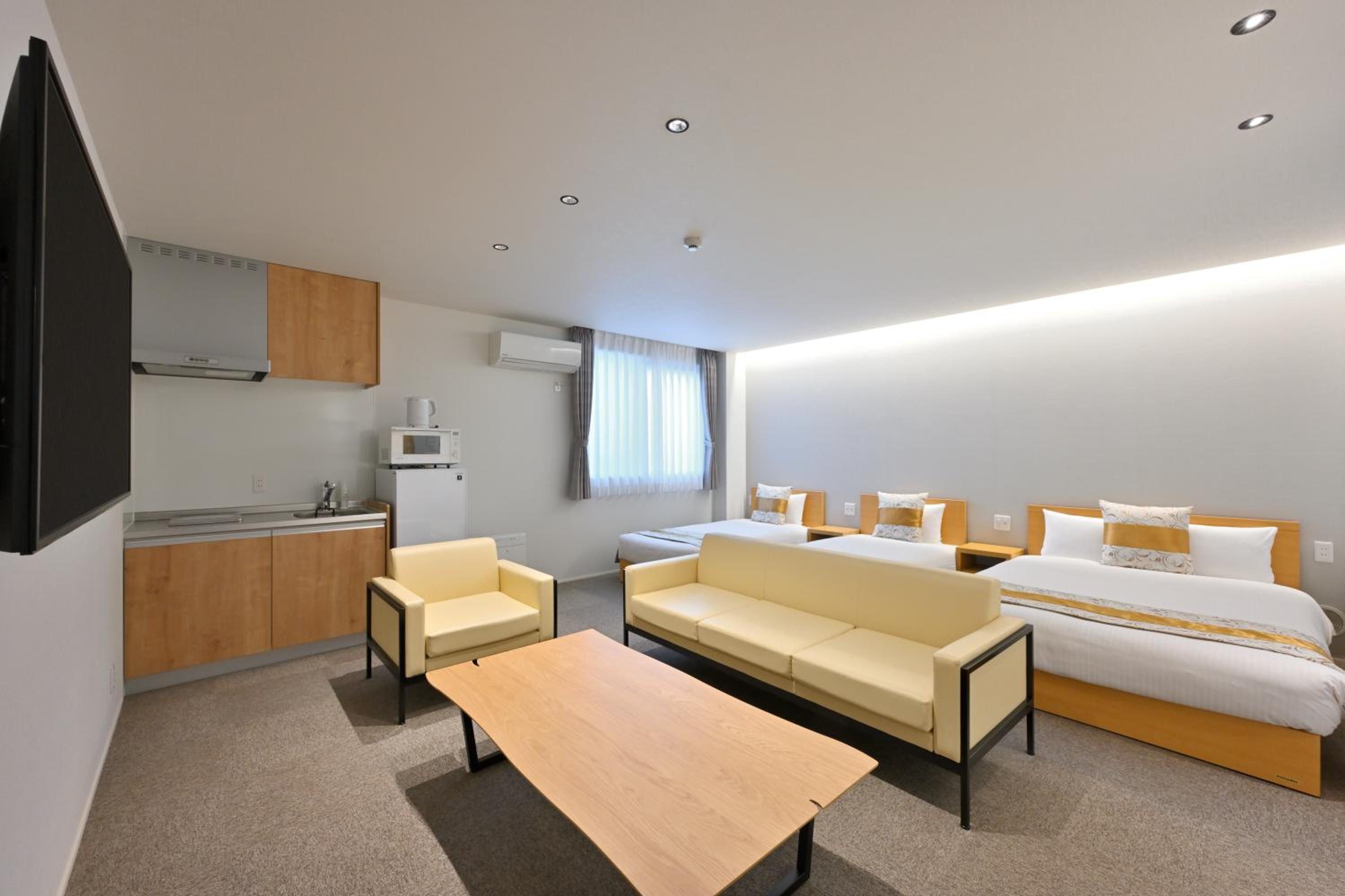Deluxe Triple Room - Photo 1