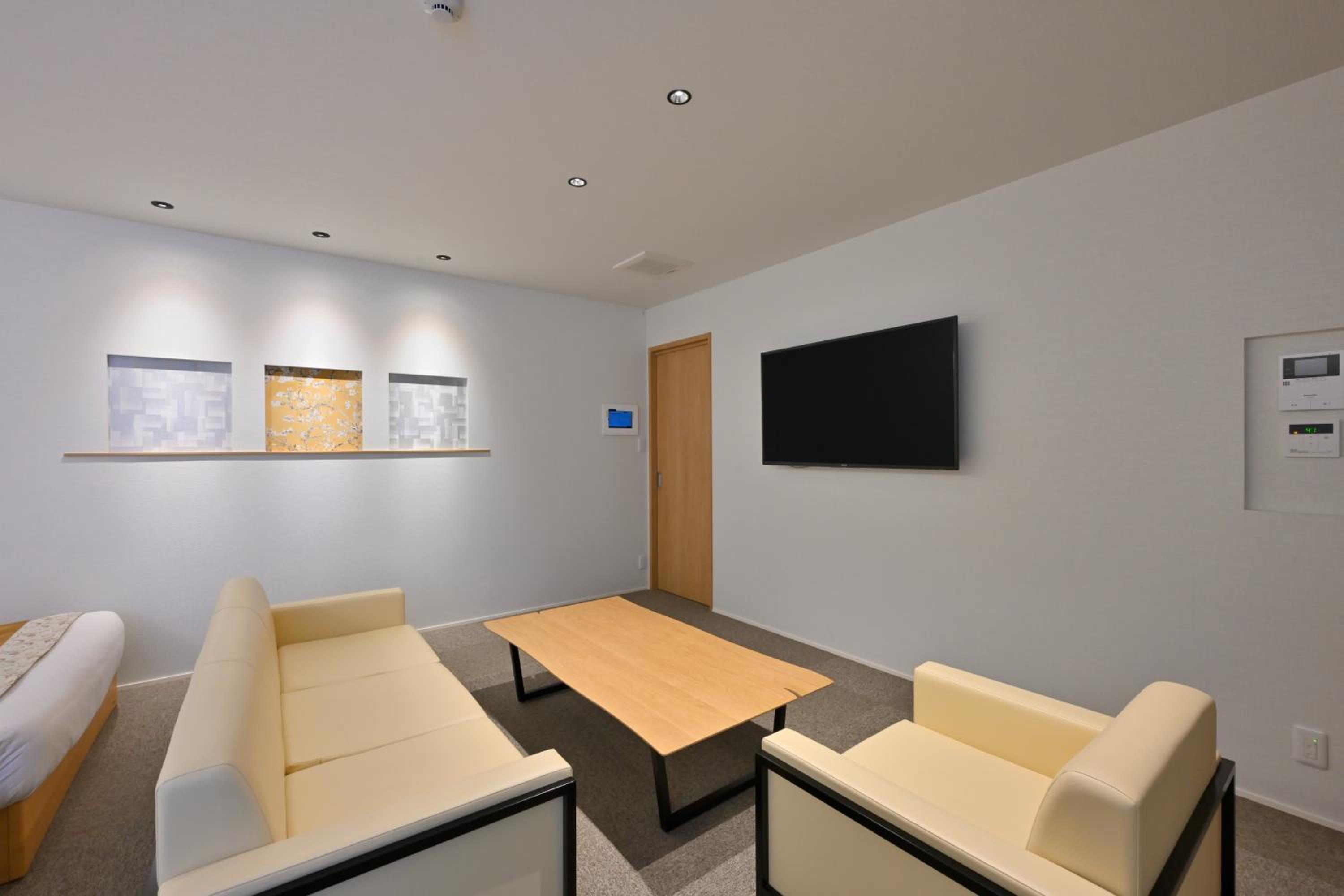Deluxe Triple Room - Photo 19