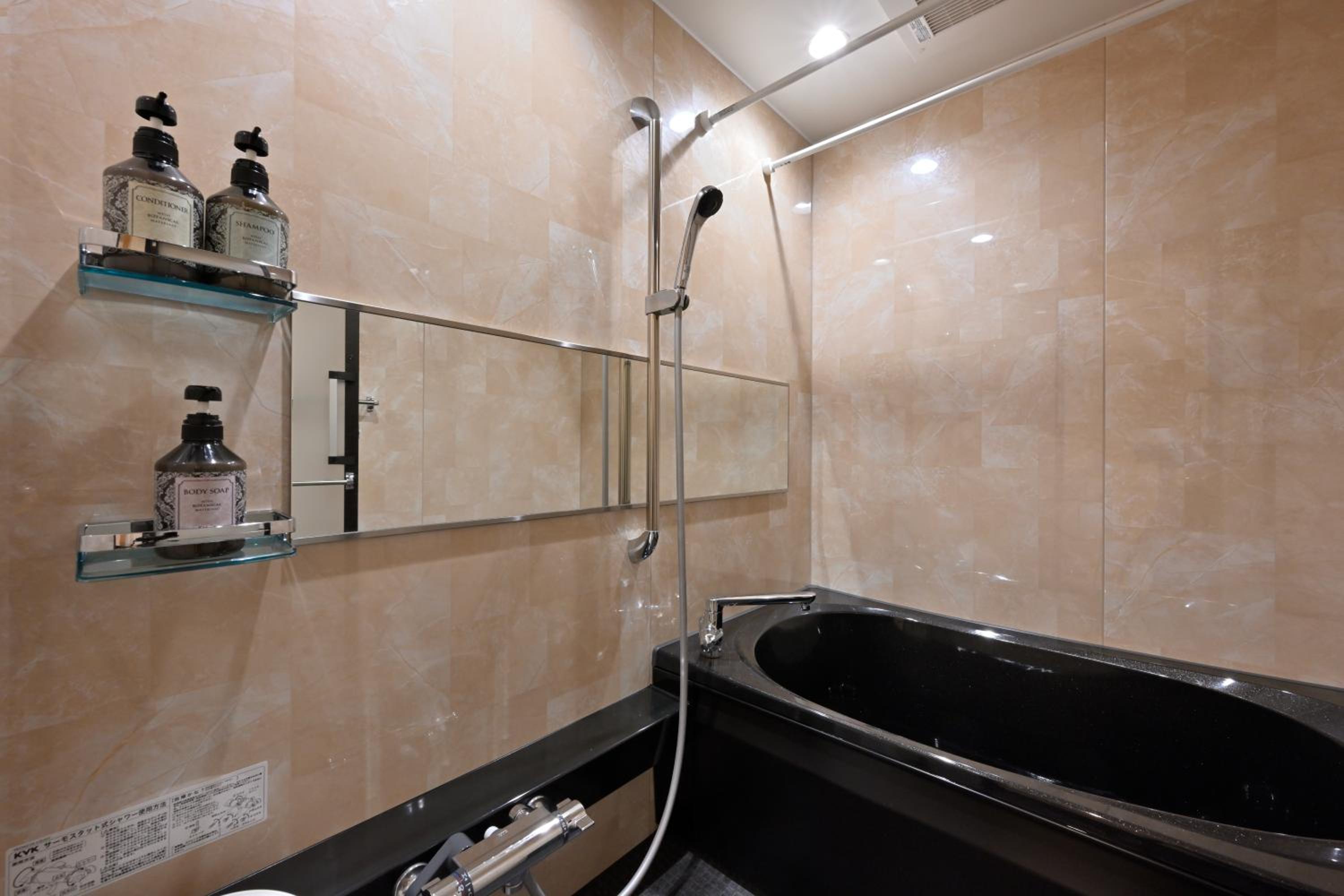 Deluxe Triple Room - Photo 16